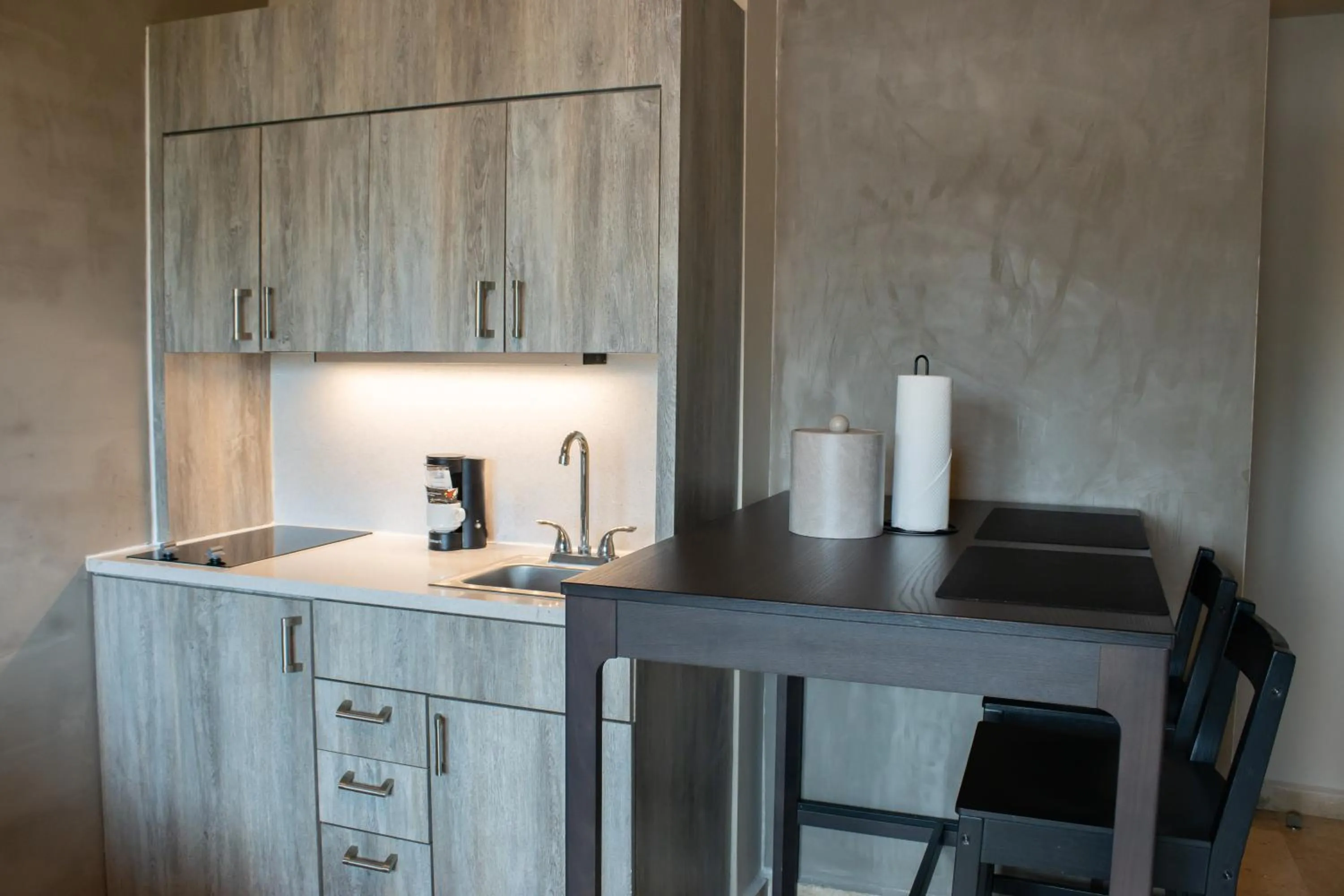 Kitchen or kitchenette in Ciqala Suites Hotel - San Juan