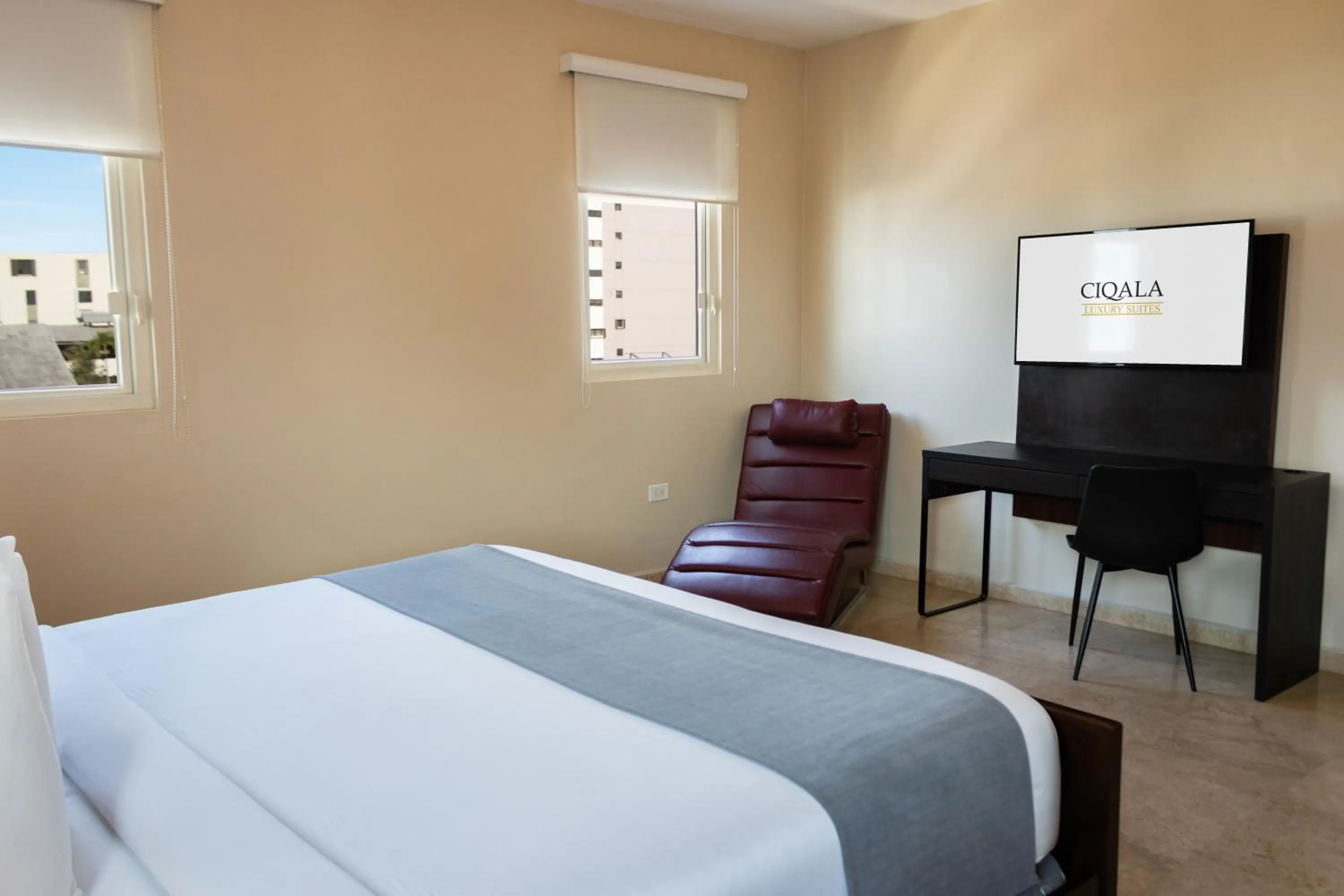 Bed in Ciqala Suites Hotel - San Juan