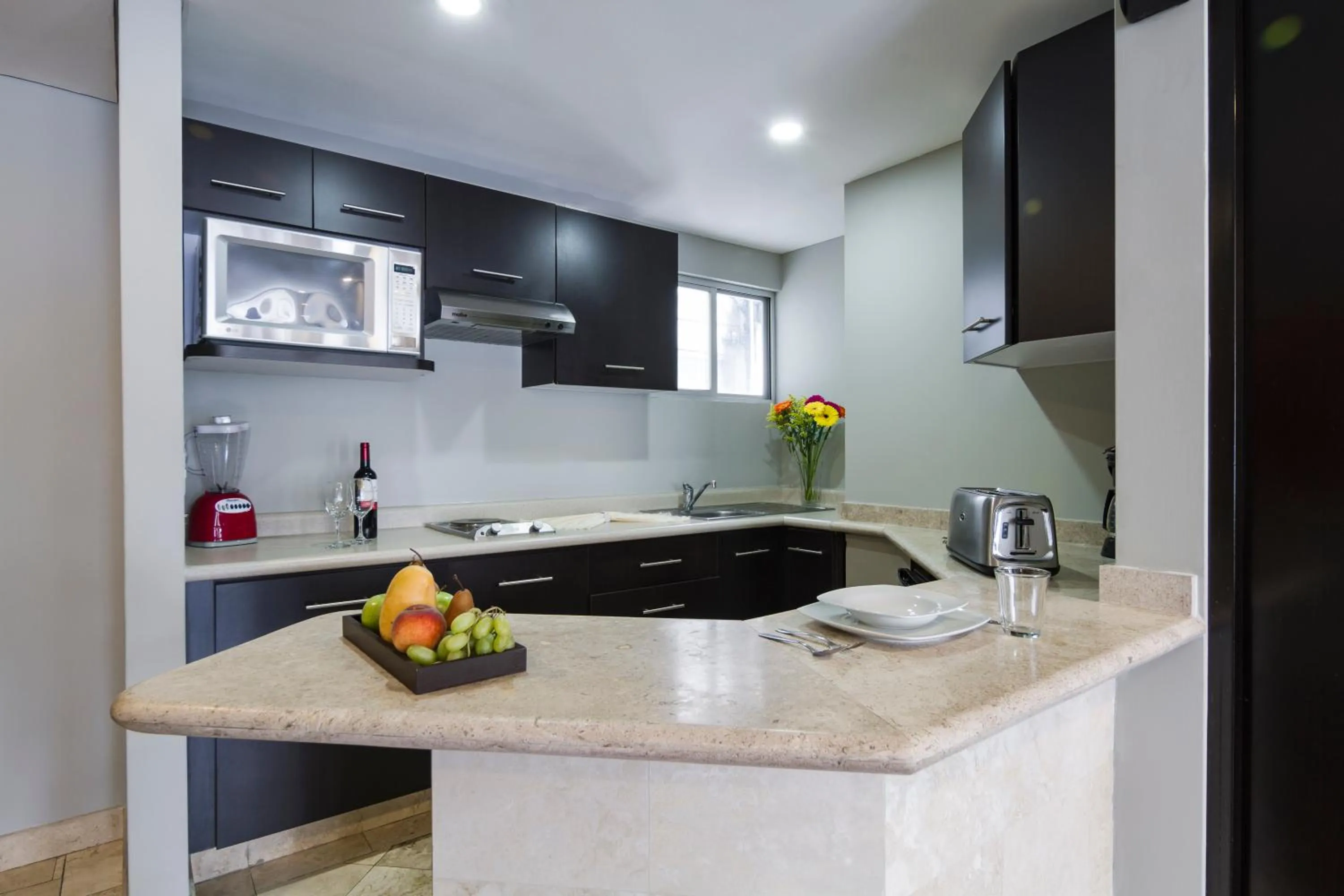 Kitchen or kitchenette in Suites Parioli