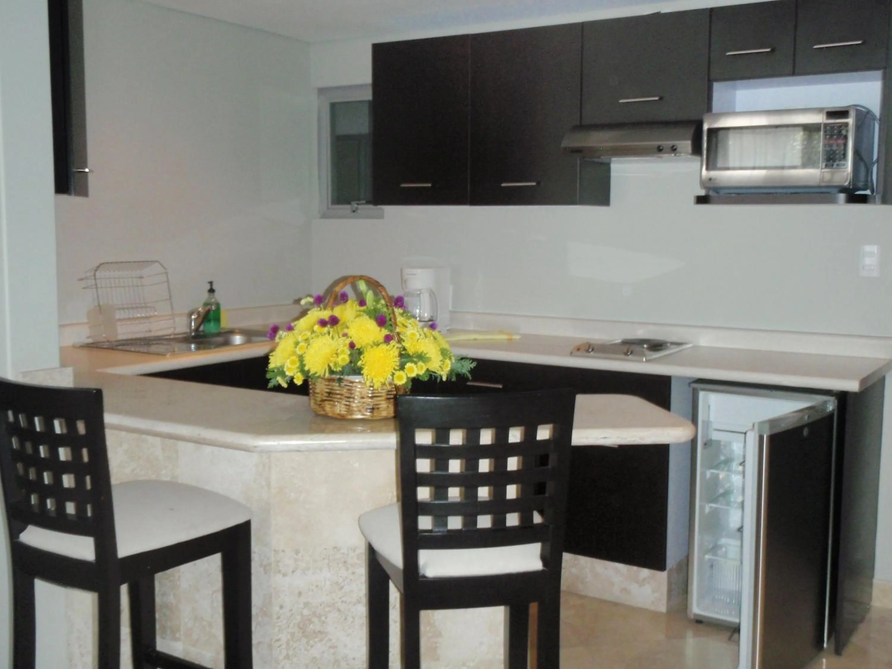 Kitchen or kitchenette in Suites Parioli