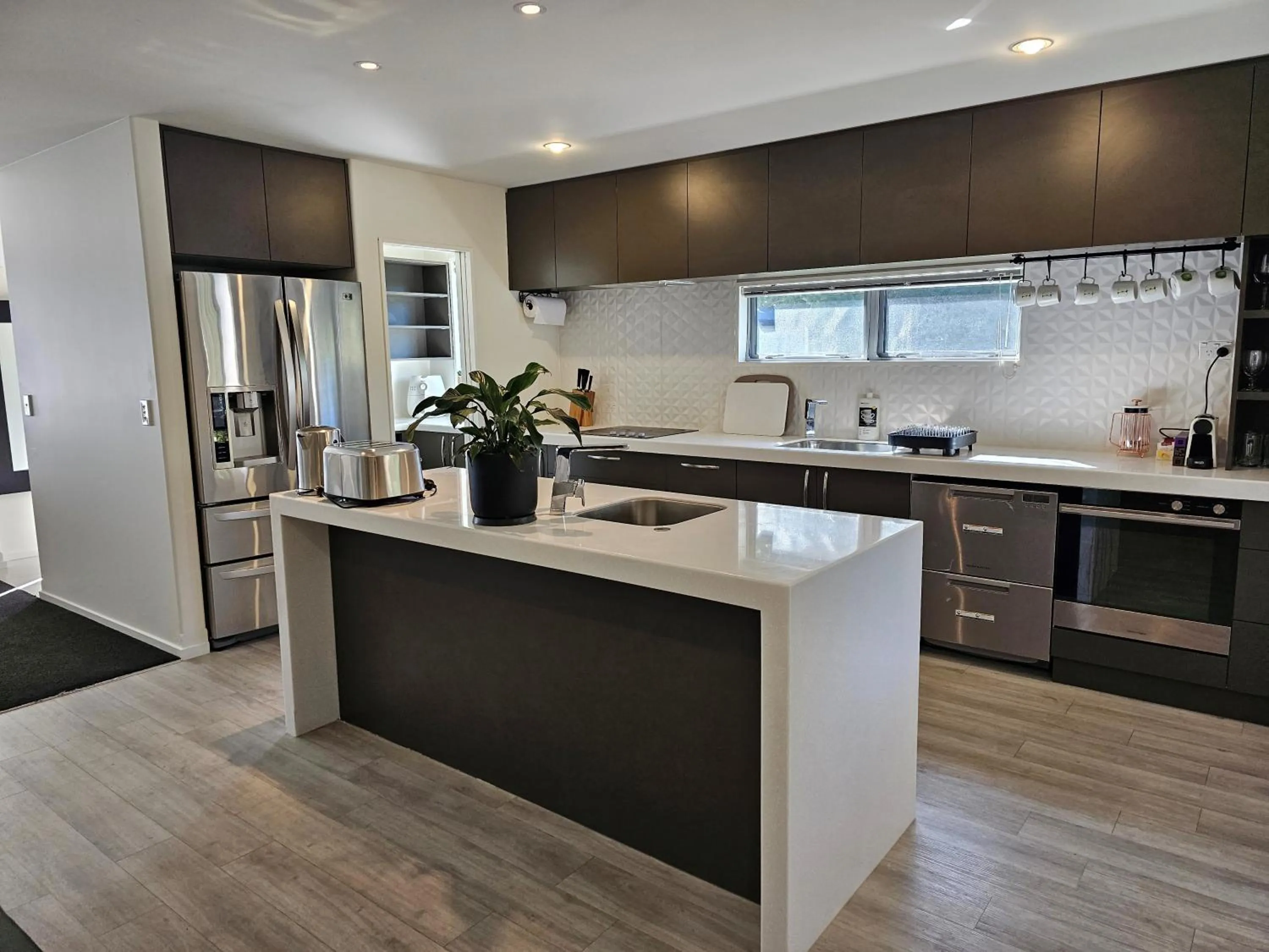 Kitchen or kitchenette in Azena Suites & Apartment