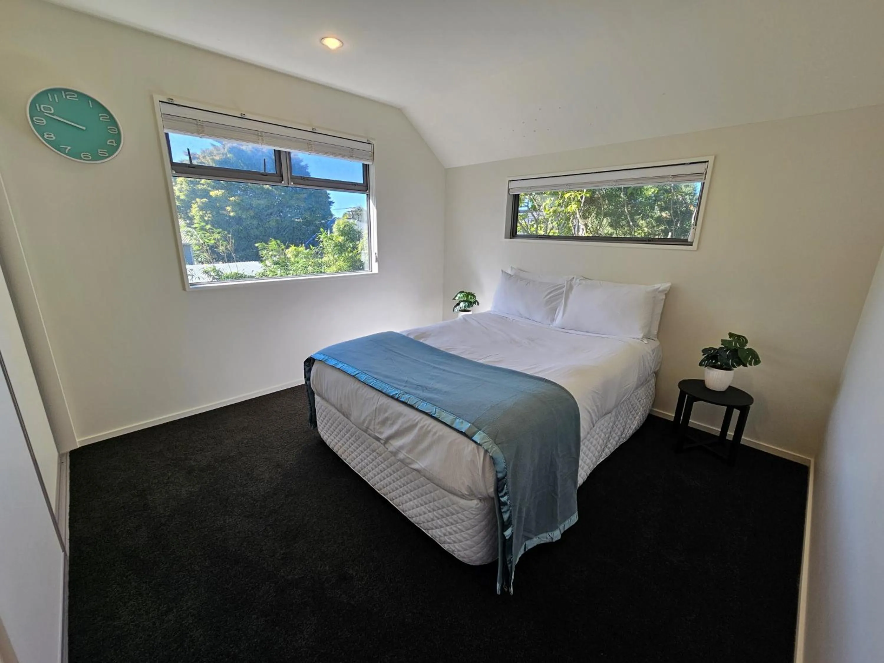 Bed in Azena Suites & Apartment