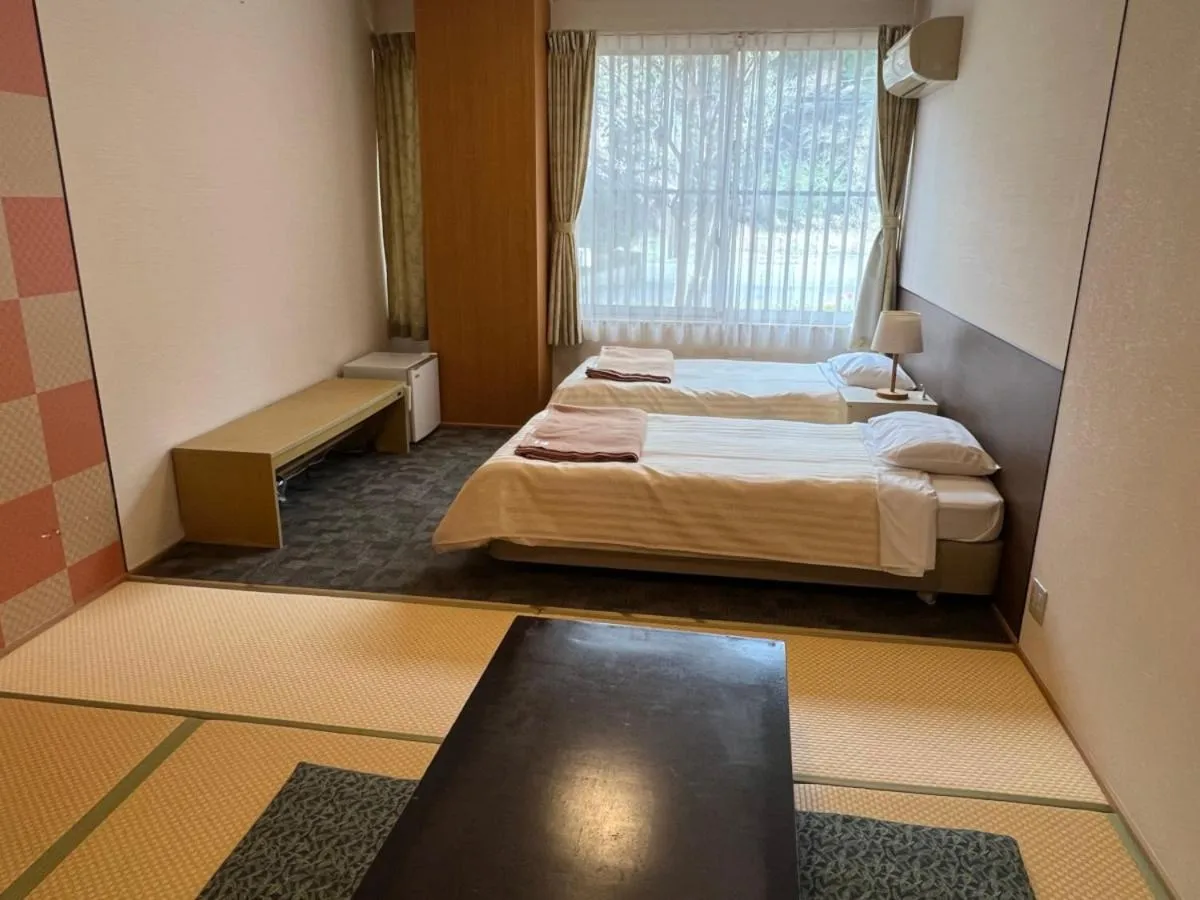 Bed in Itoen Hotel Shiobara