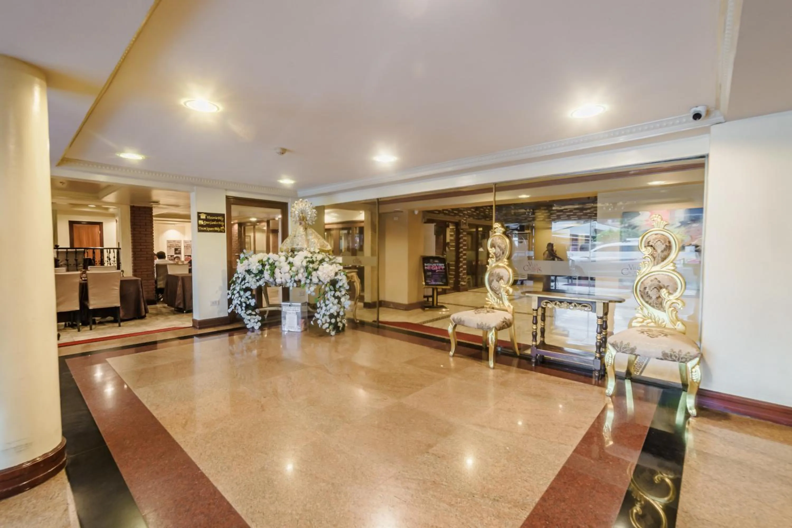 Lobby or reception in Villa Caceres Hotel