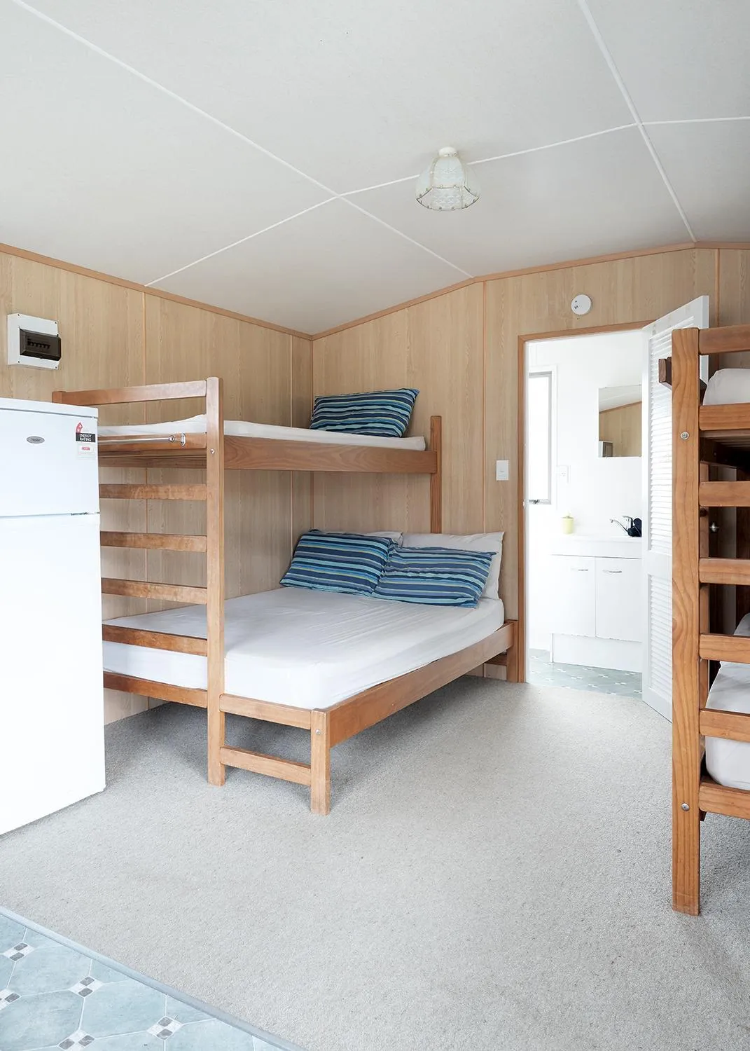 Photo of the whole room, Bed in Mercury Bay Holiday Park
