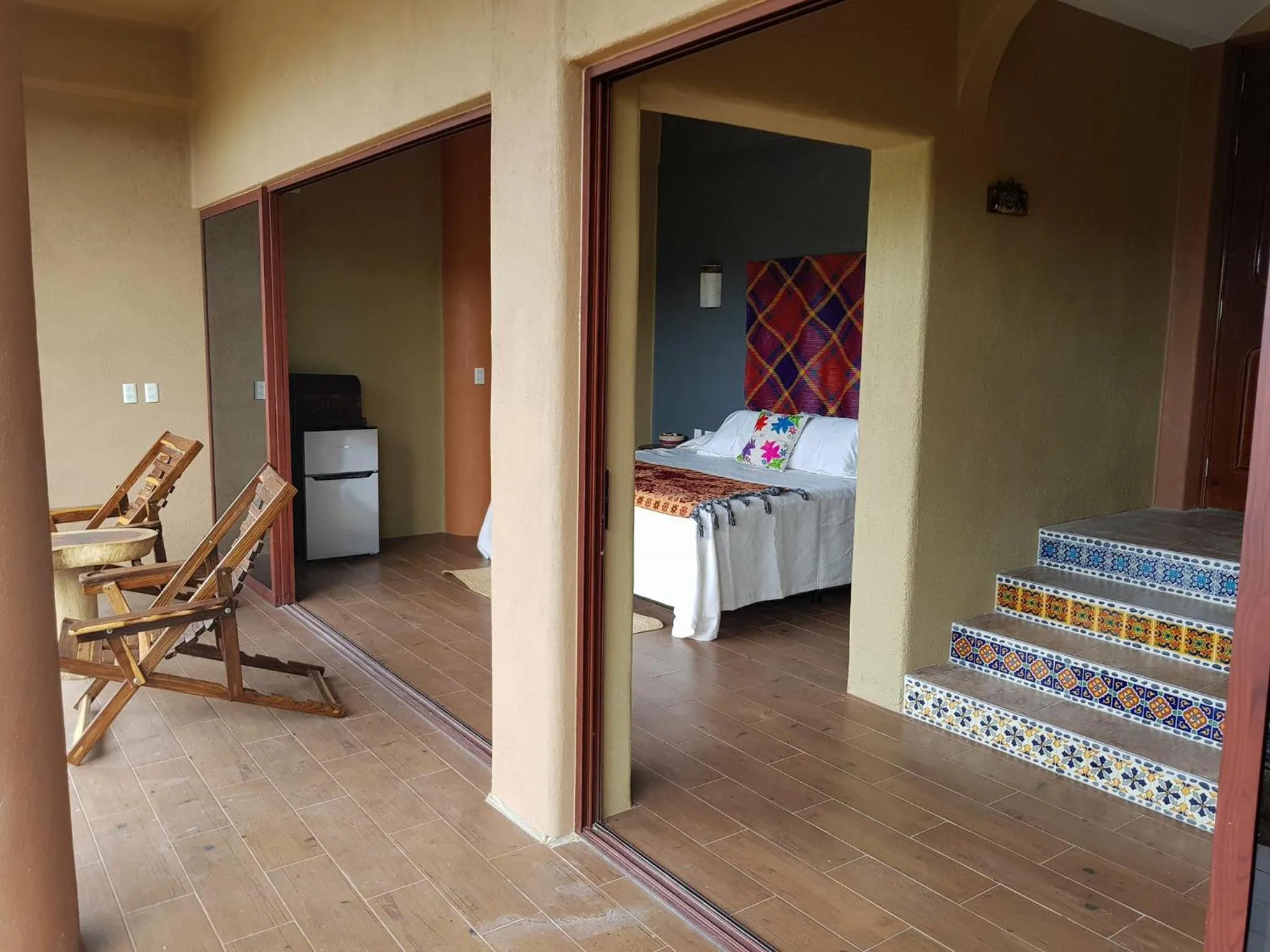 Bed in Casa Arcoiris Zihuatanejo B&B