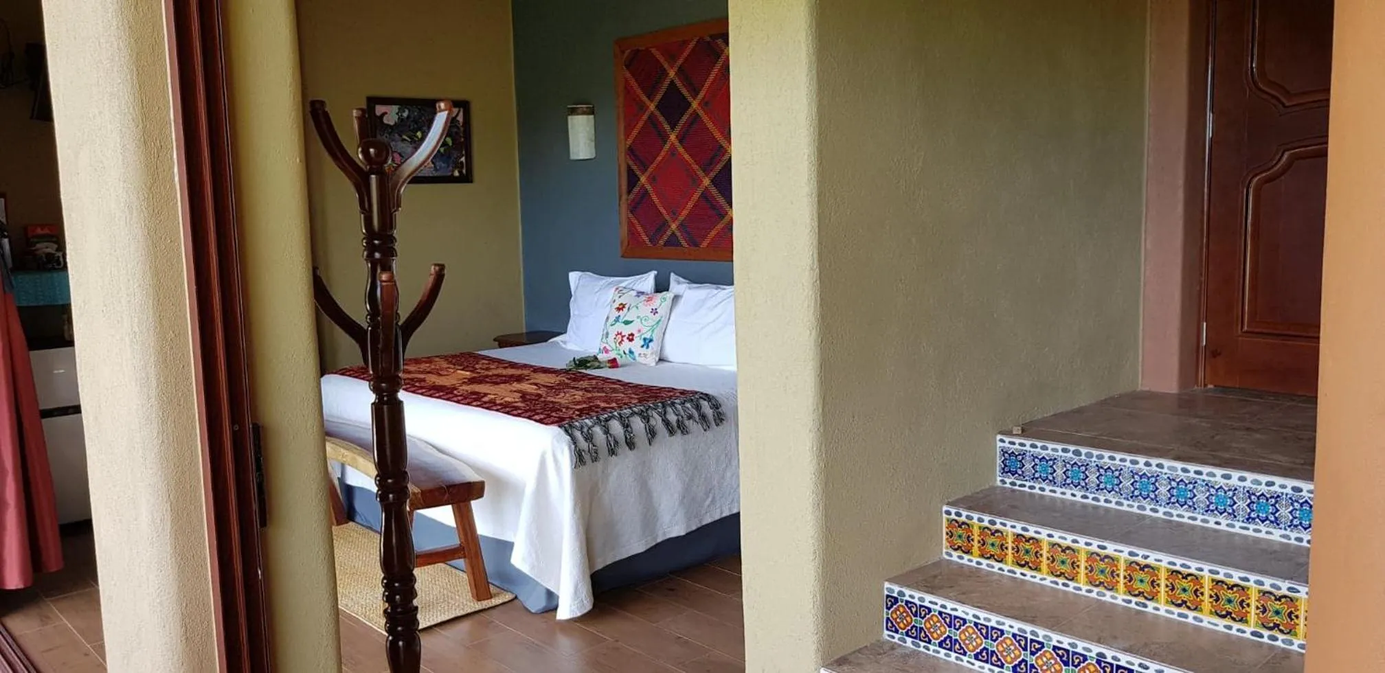 Bed in Casa Arcoiris Zihuatanejo B&B