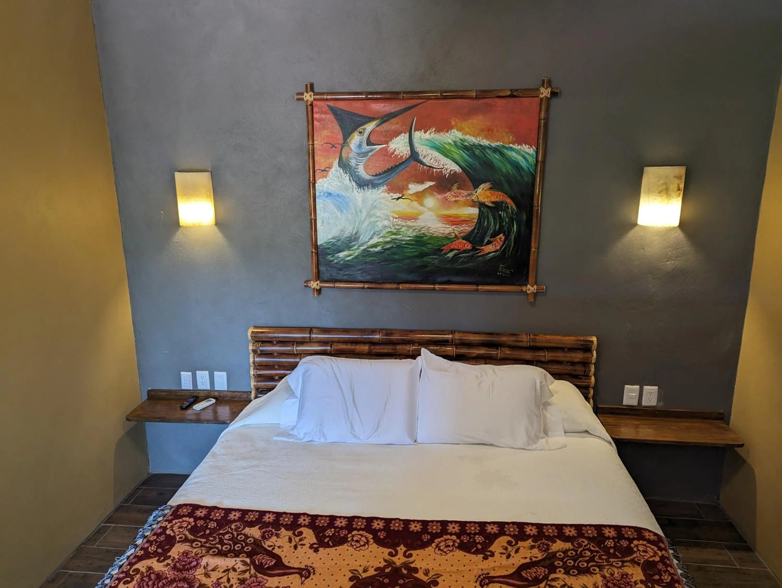 Bed in Casa Arcoiris Zihuatanejo B&B