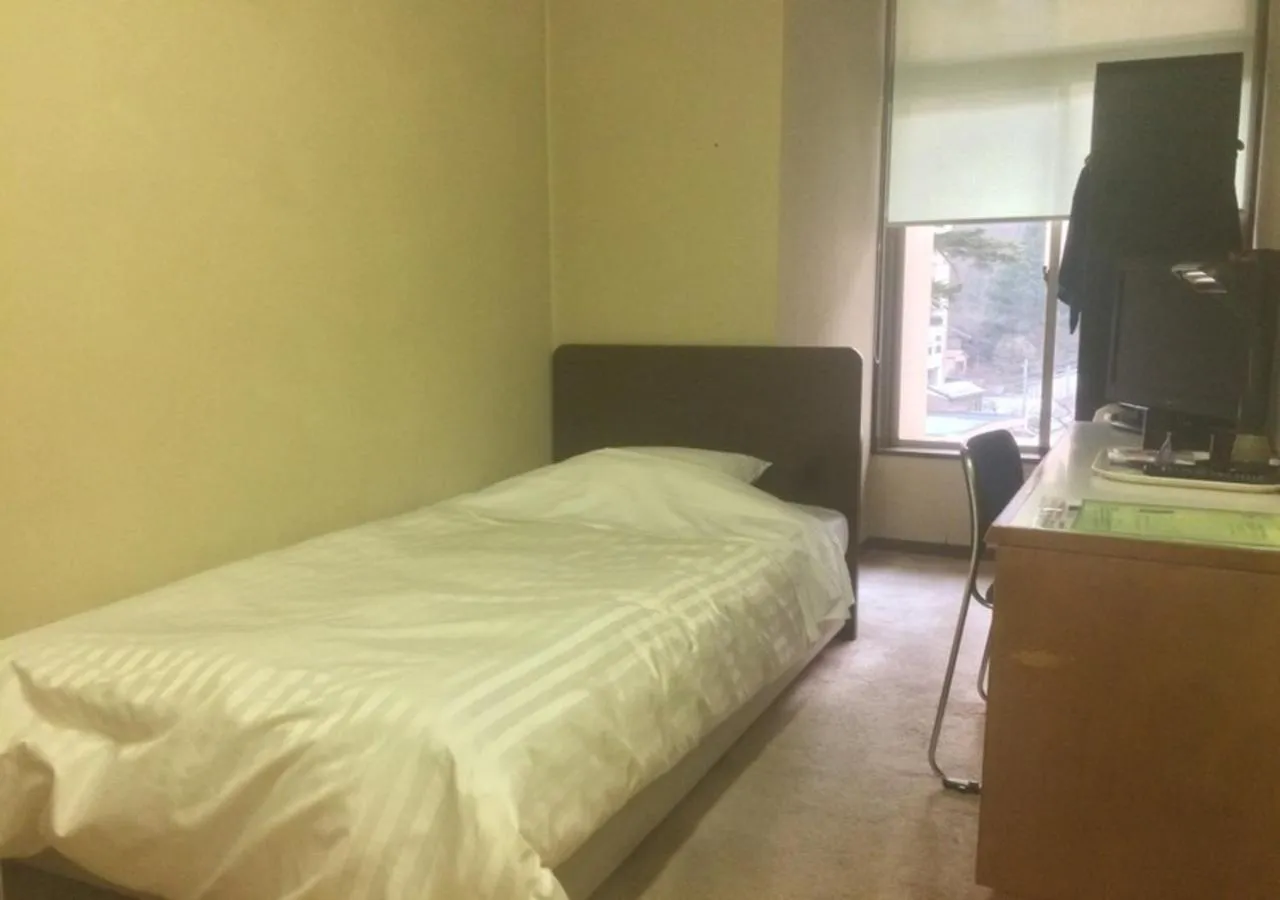 Bed in Higashiyama Park Hotel Shinfugetsu