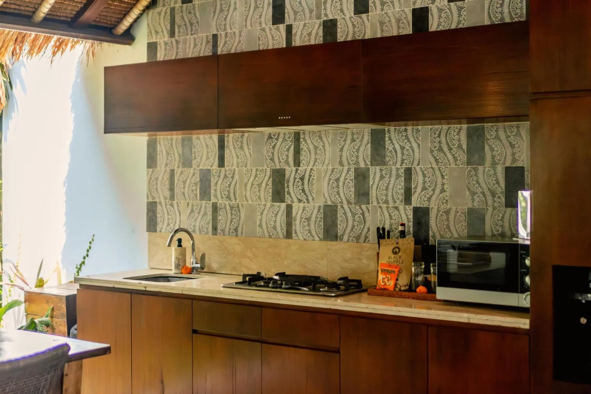 kitchen in Kecapi Villa Seminyak by Ini Vie Hospitality