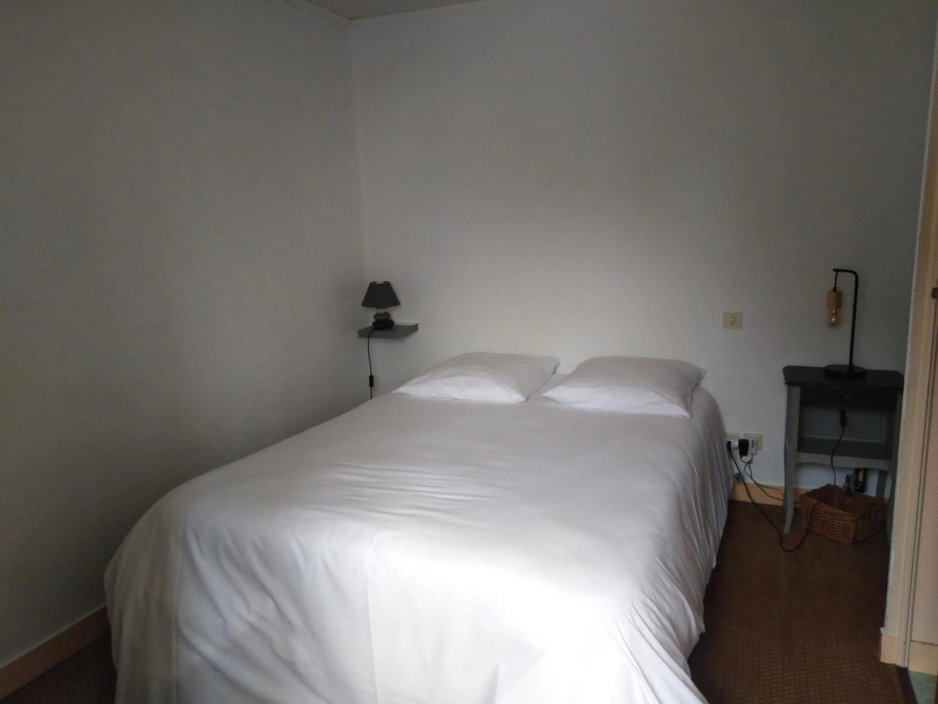 Bed in Hotel Restaurant Le Capricorne