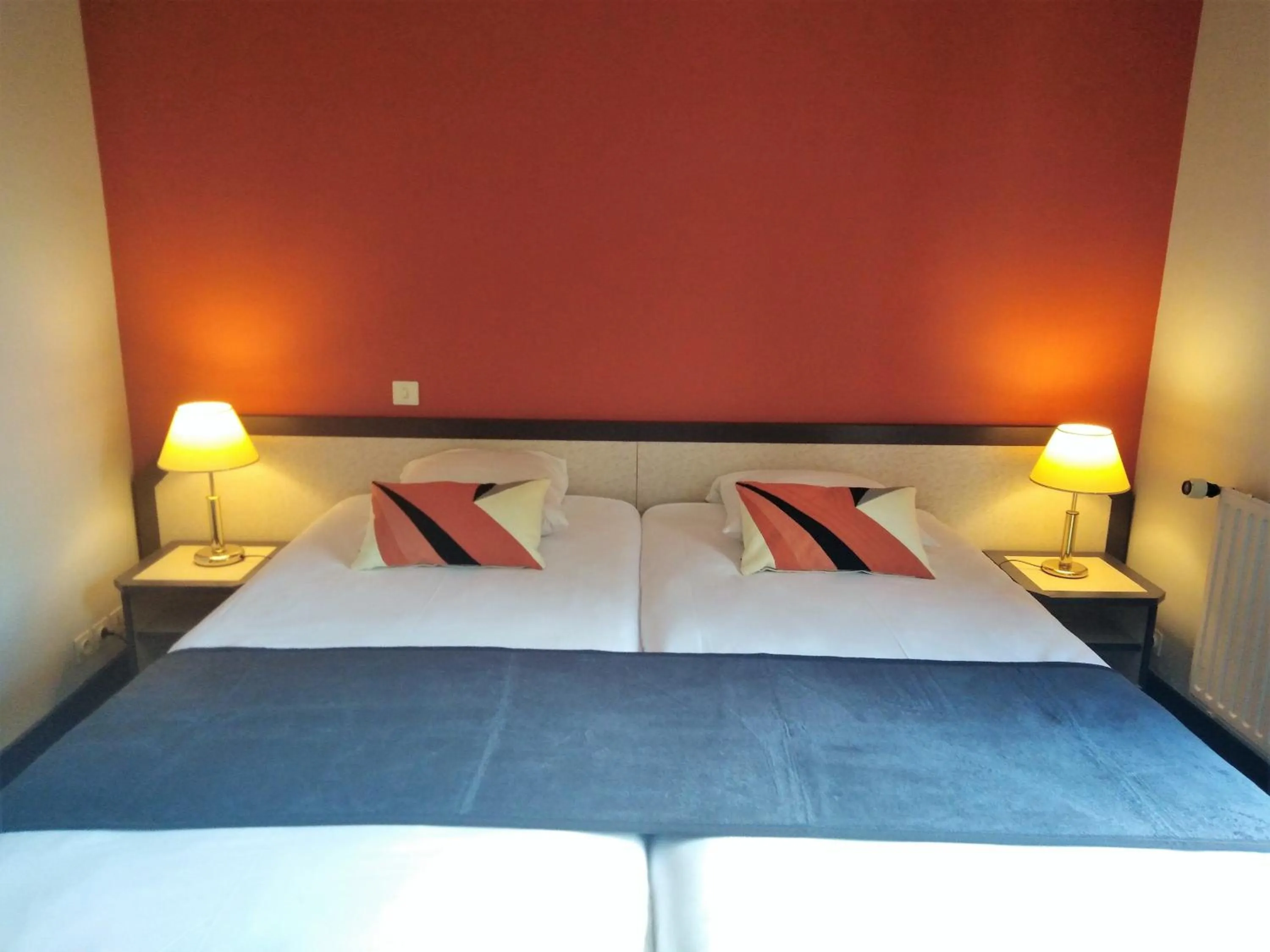 Bed in Hotel Restaurant Le Capricorne