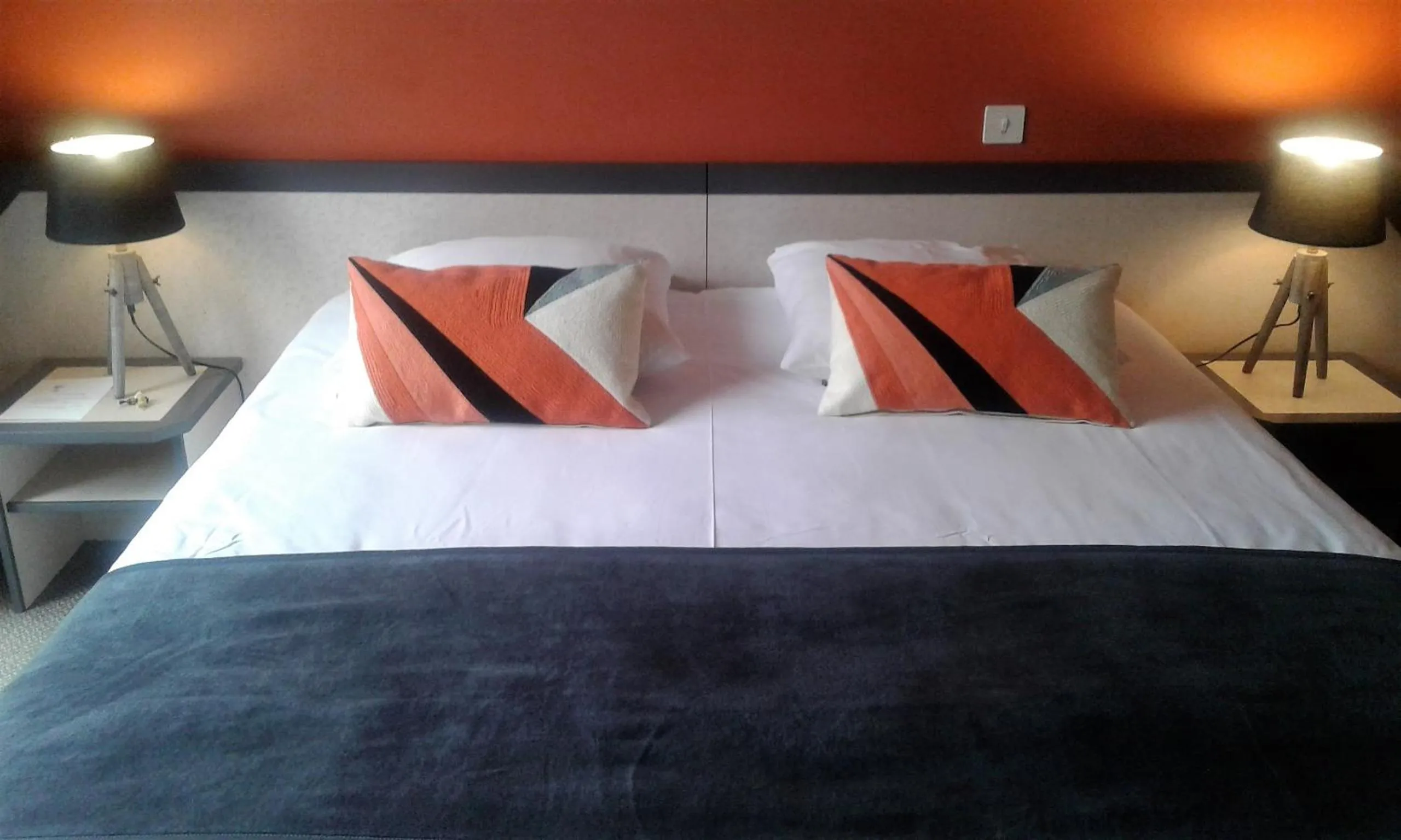 Bed in Hotel Restaurant Le Capricorne