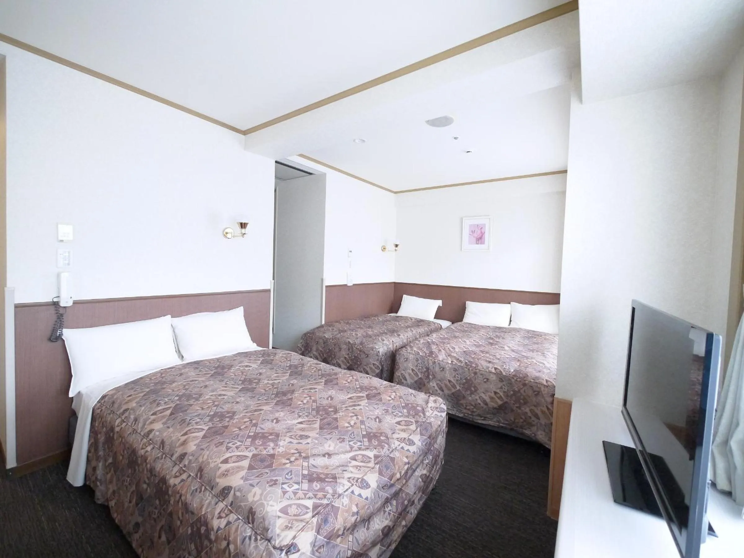 Photo of the whole room, Bed in U-Community Hotel