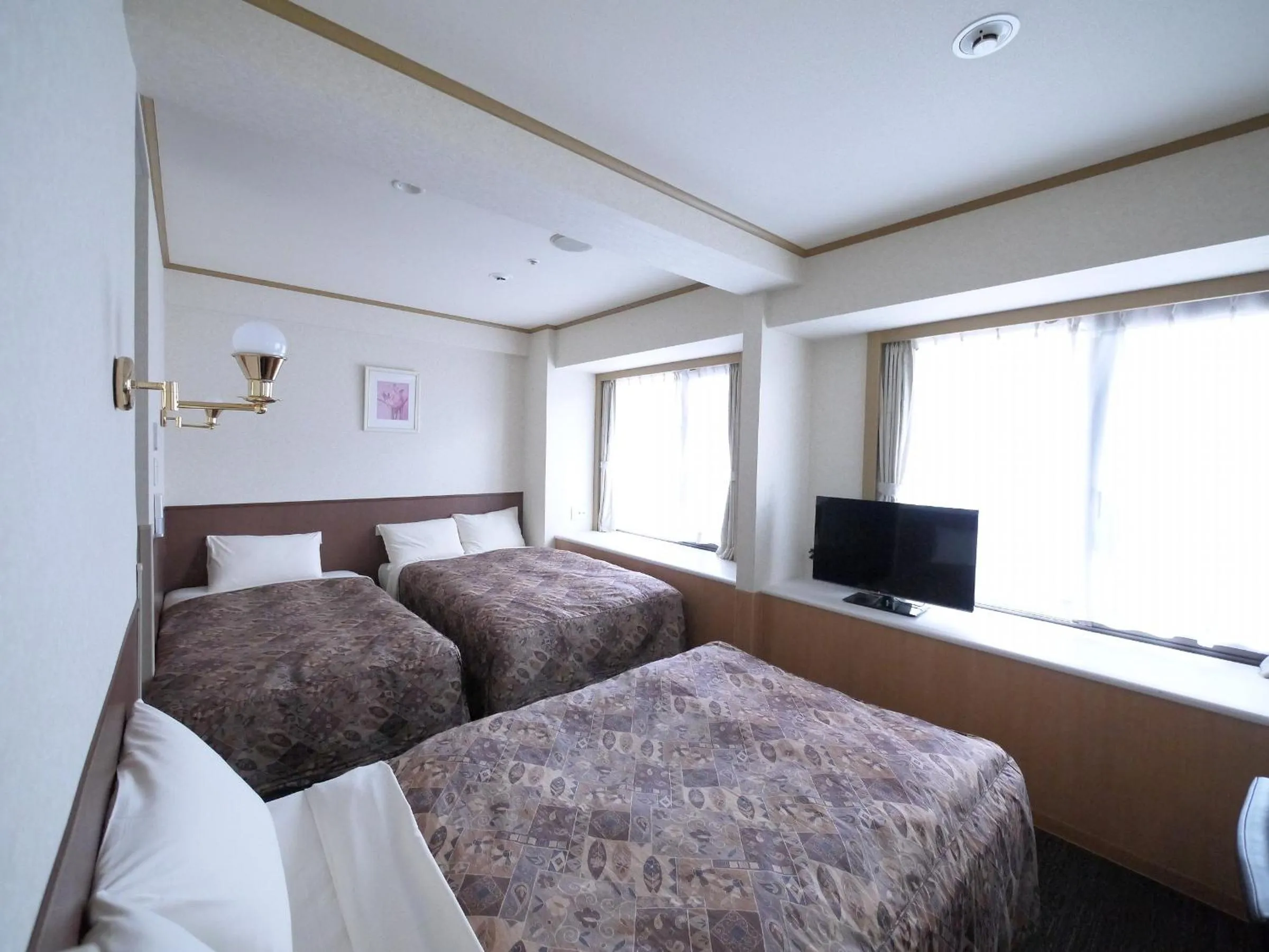 Photo of the whole room, Bed in U-Community Hotel