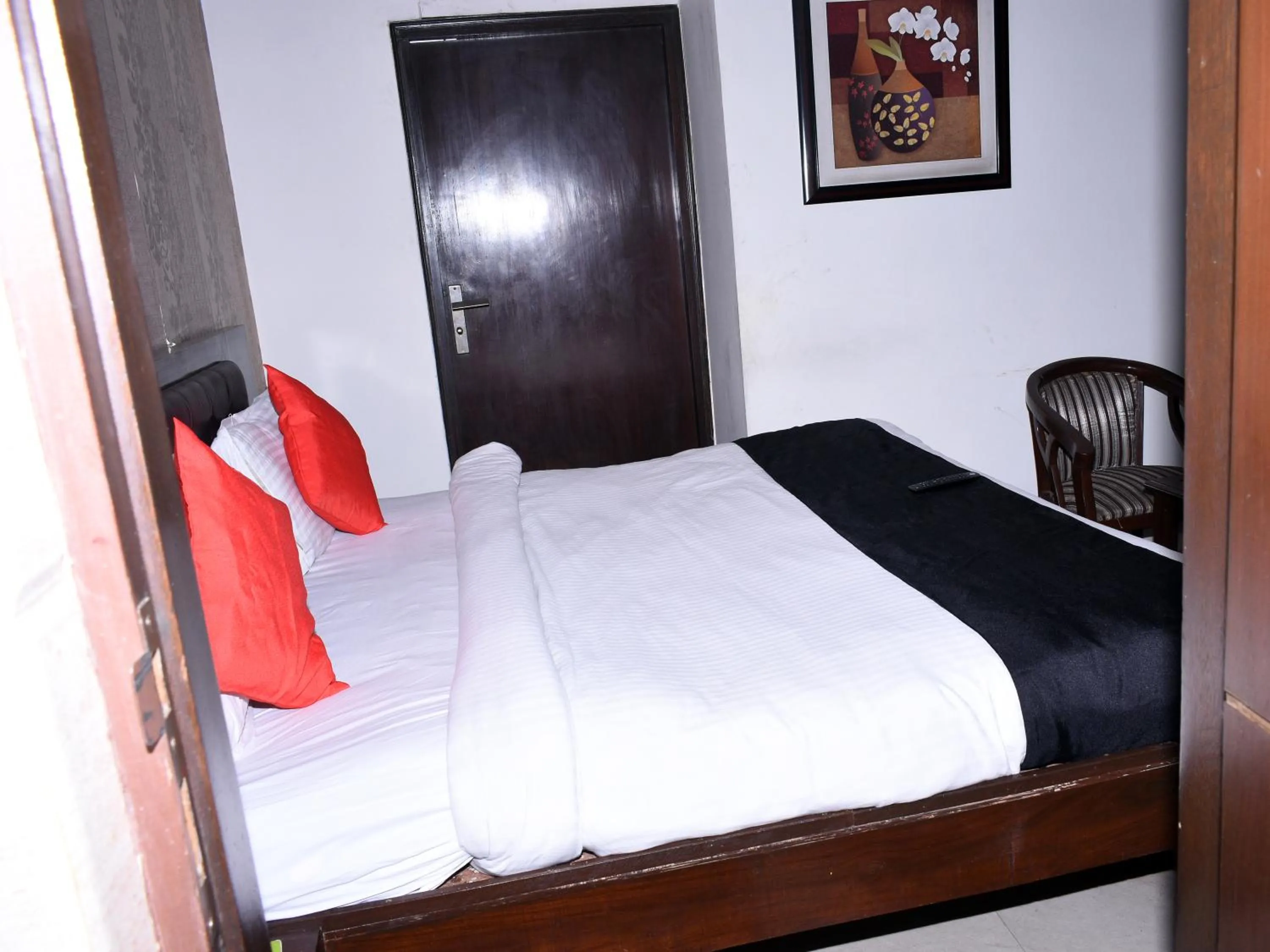Bed in Hotel Flora Inn
