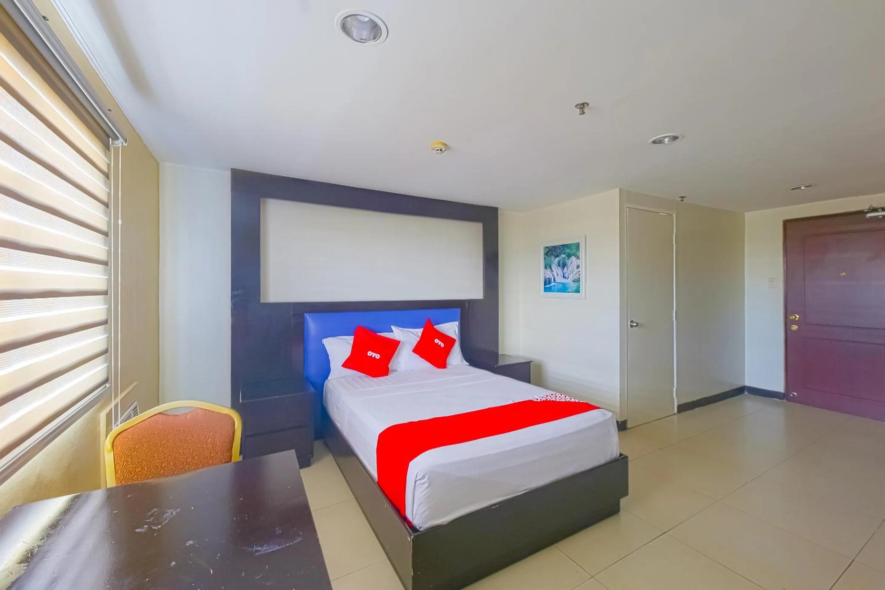 Bedroom in Super OYO 791 Bell Mansion