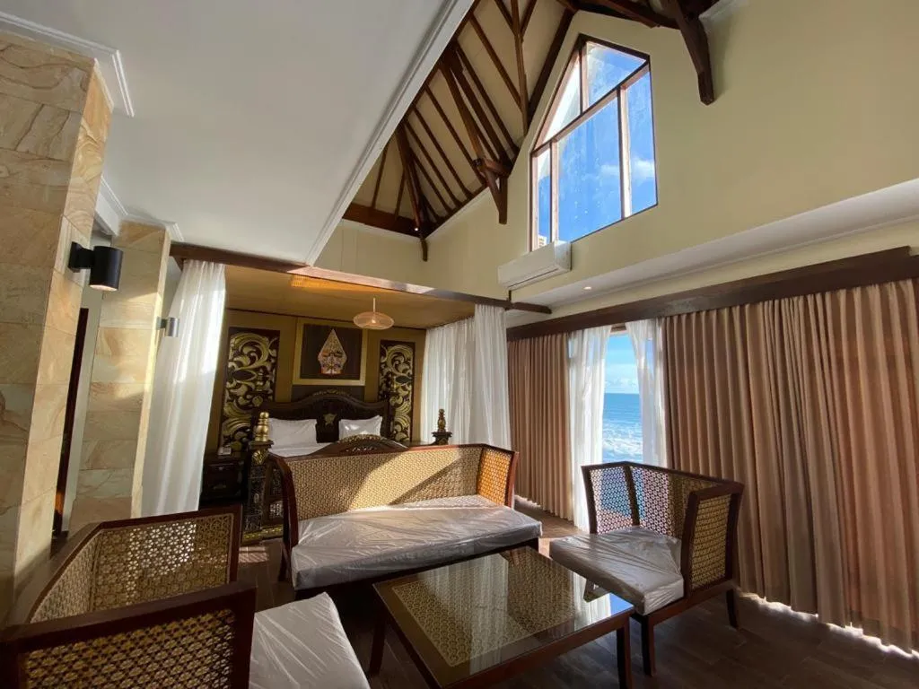 Bed in Queen of the South Beach Resort