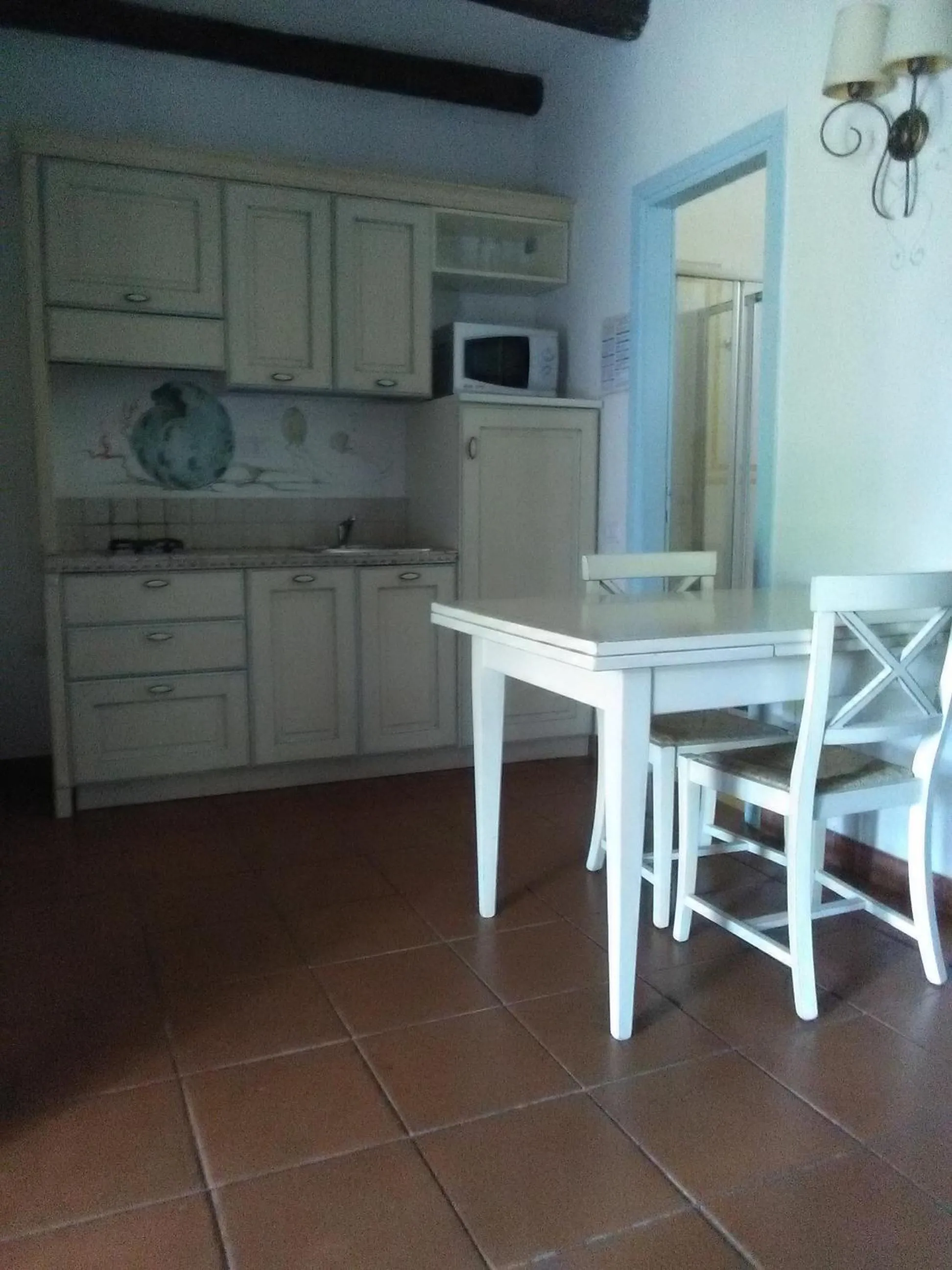 Kitchen or kitchenette in White Sand Residence