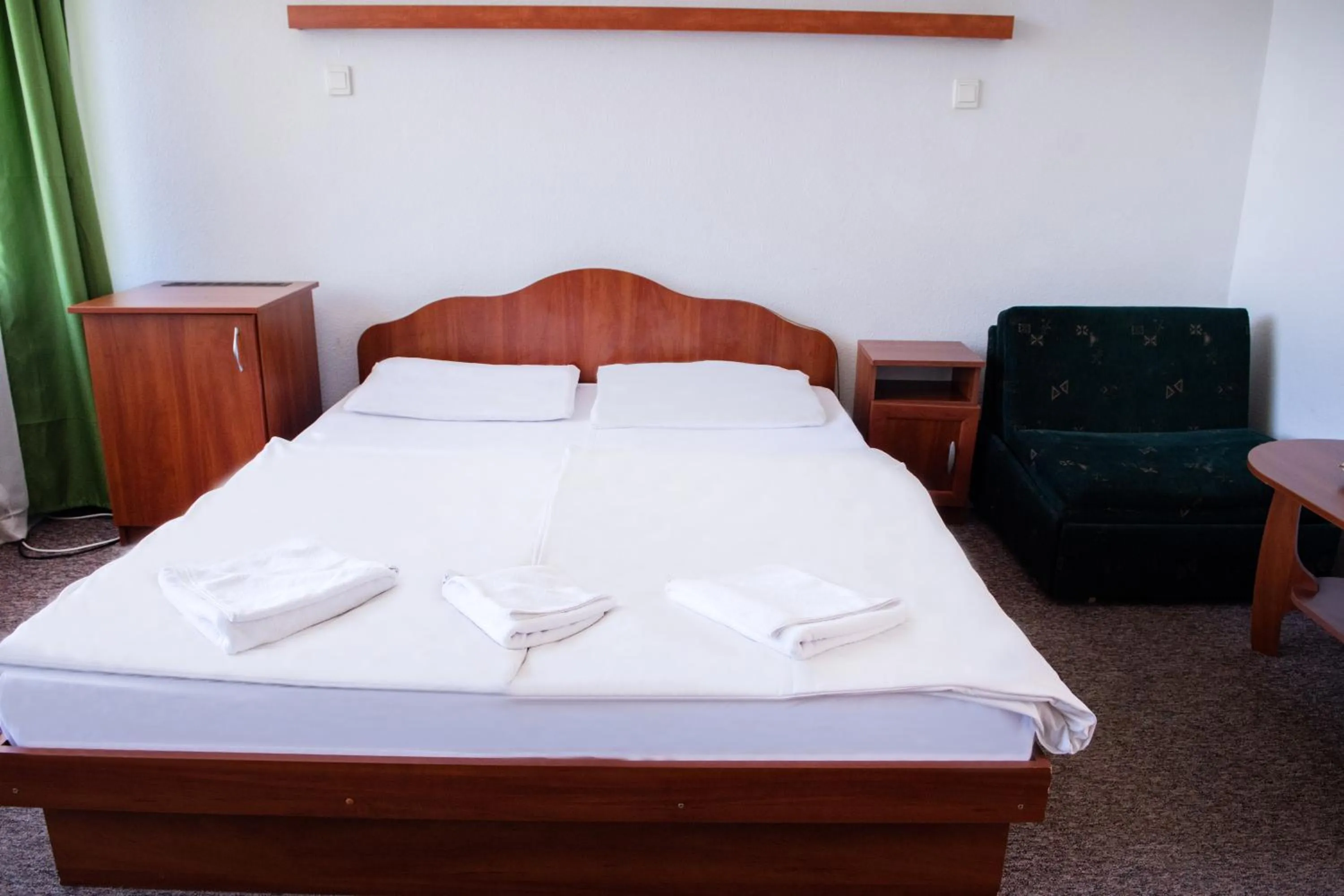 Bedroom in CE Napfény Hotel