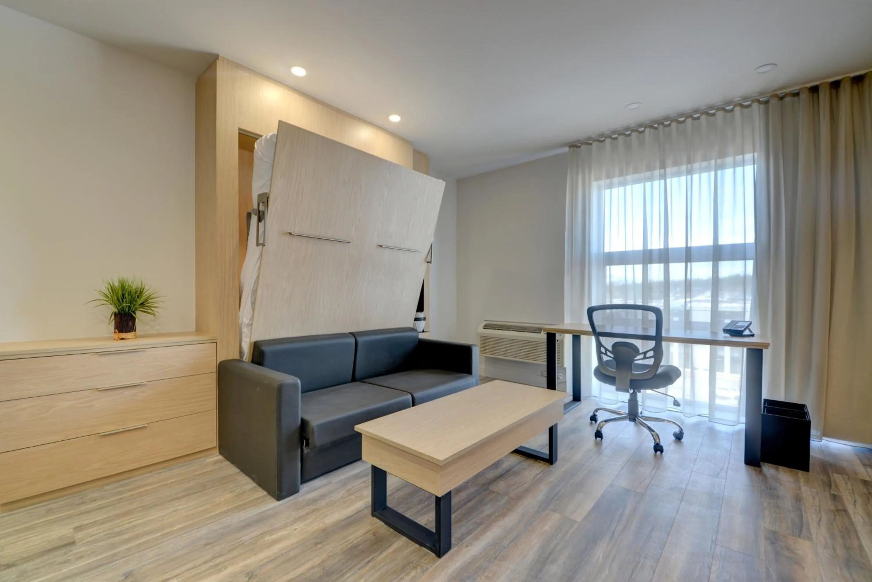 Bed in Hôtel Universel, Centre de congrès Rivière-du-Loup