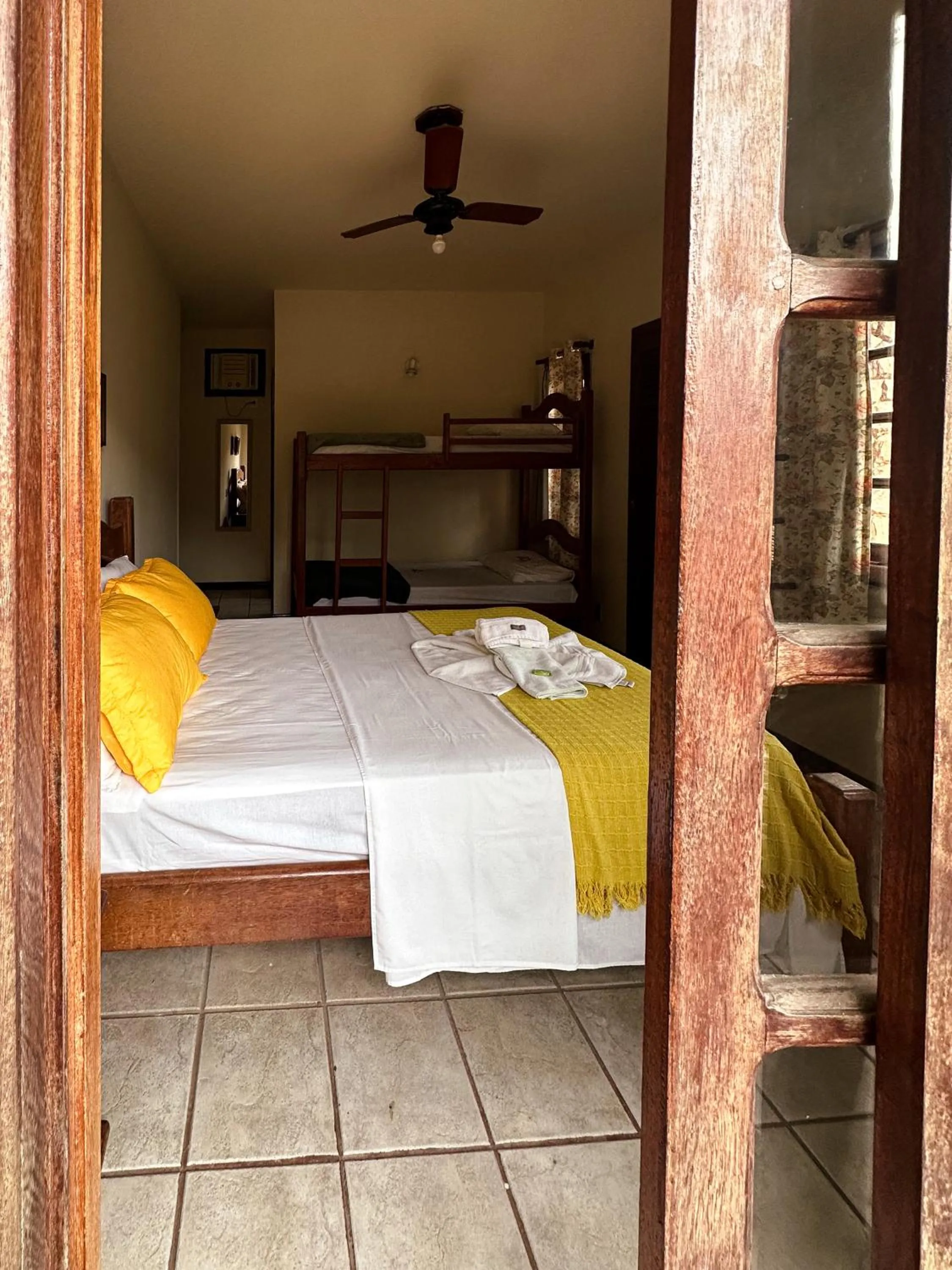 Bed in Pousada Sanhaço