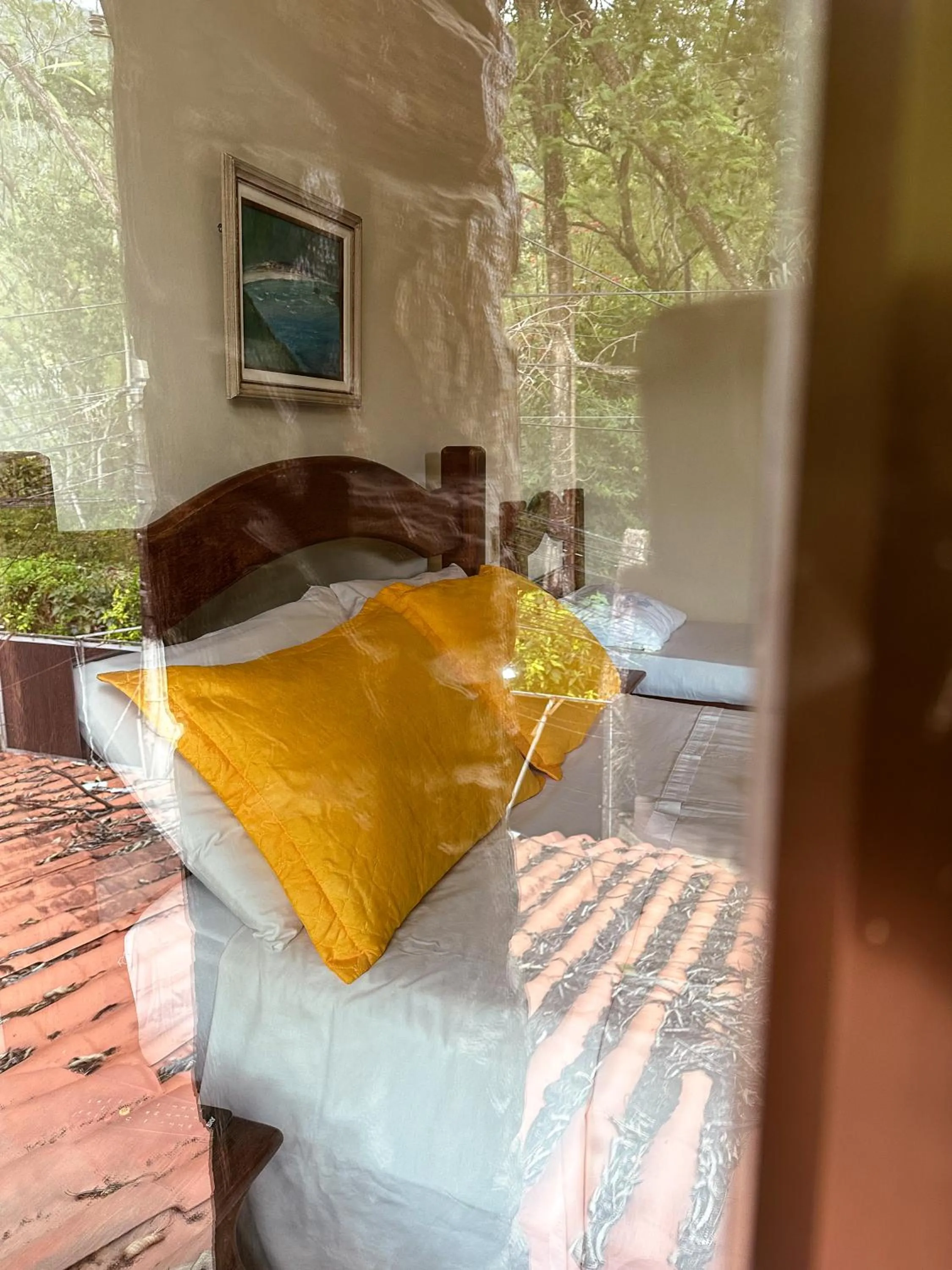 Bed in Pousada Sanhaço