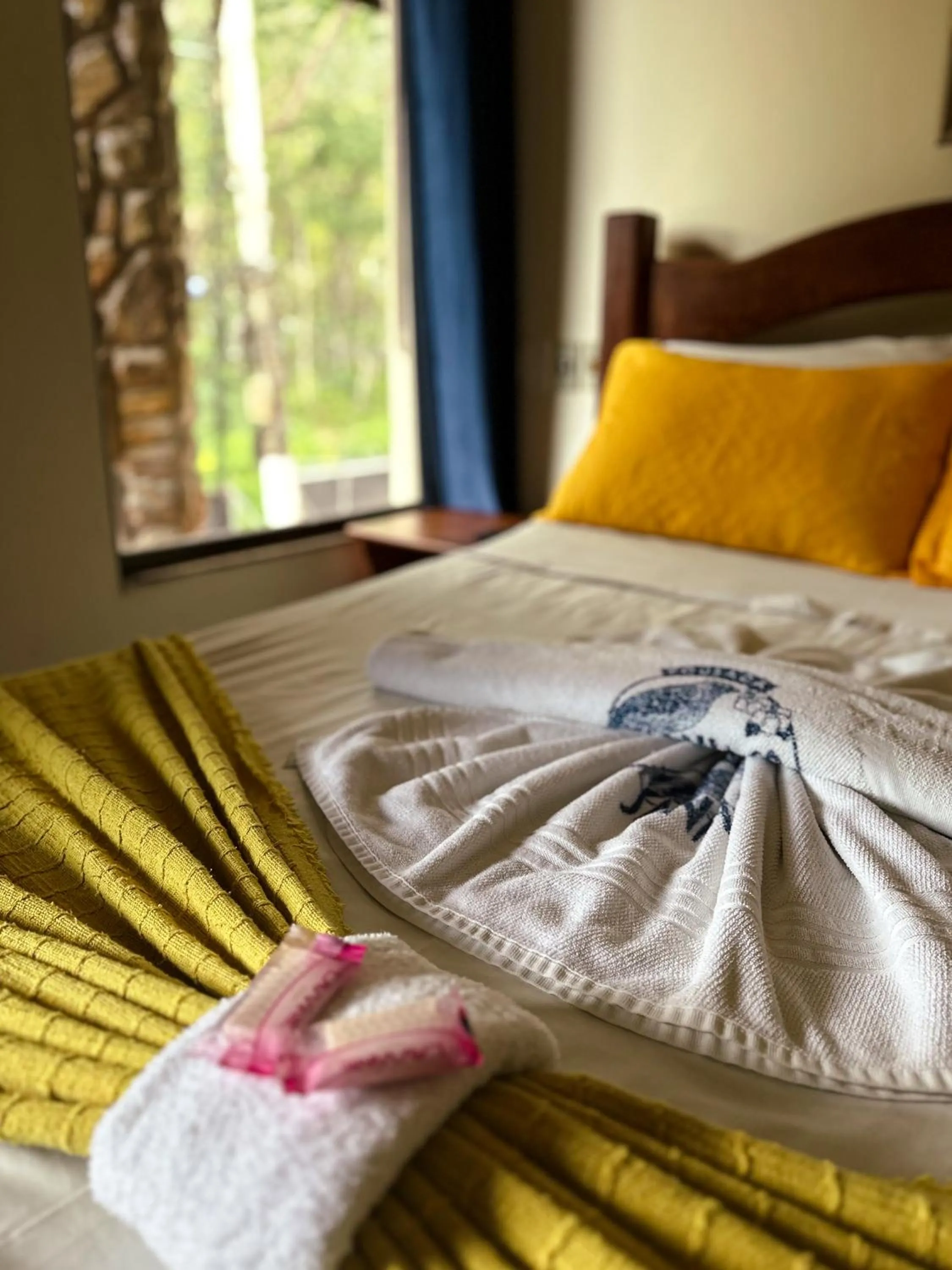 Bed in Pousada Sanhaço