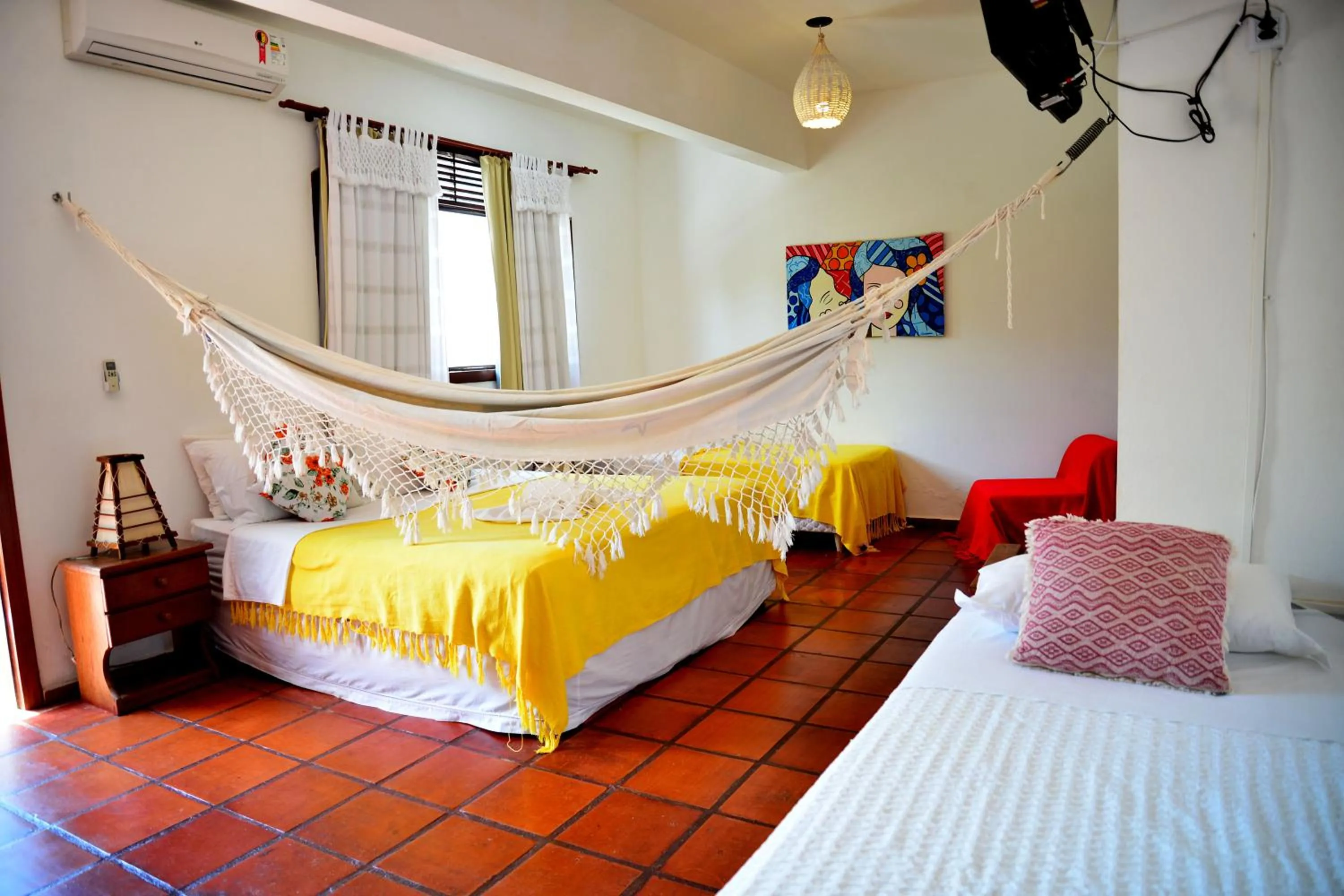 Bed in Pousada Enseada Dos Golfinhos