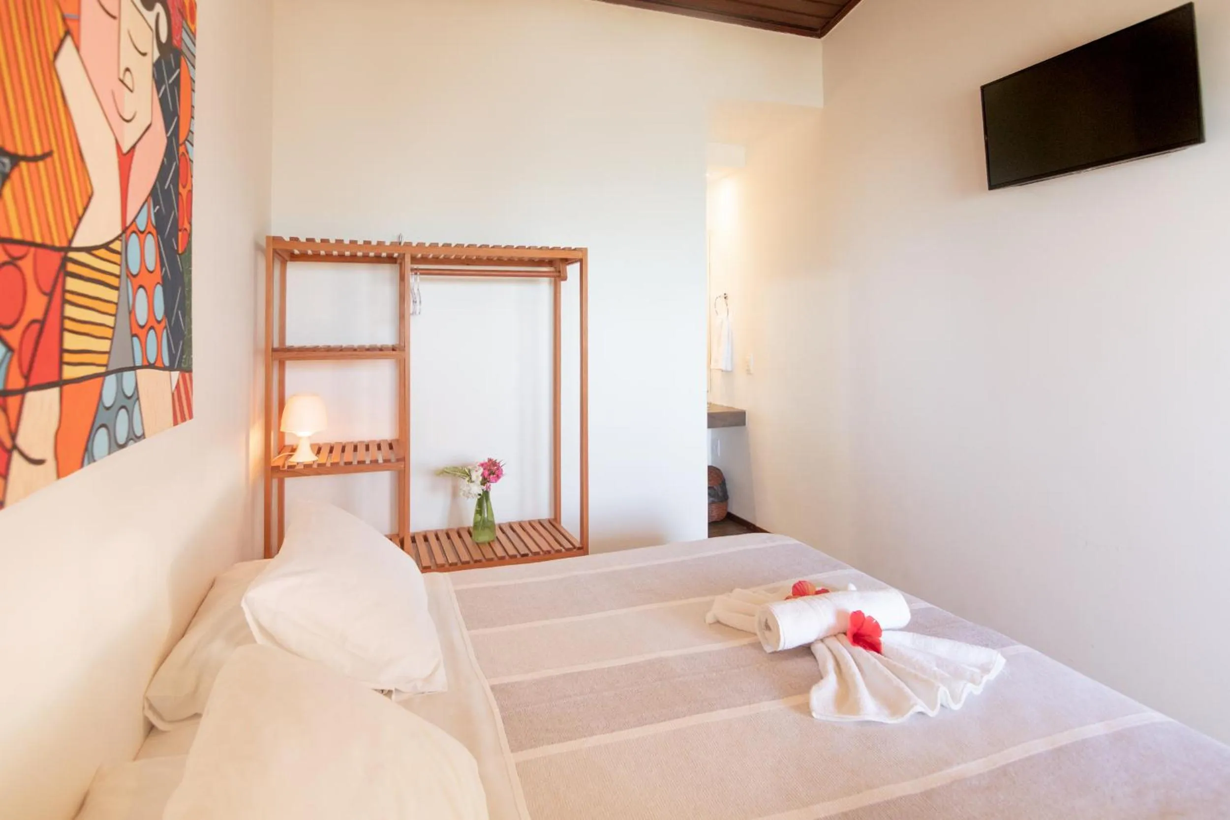 Bed in Pousada Enseada Dos Golfinhos