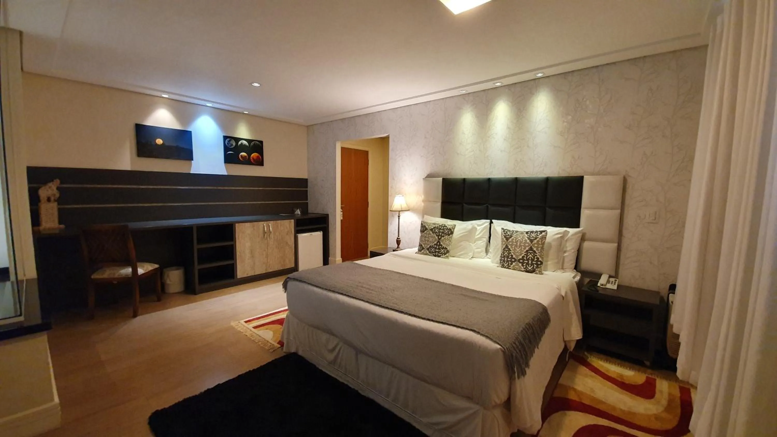 Bed in Pousada Annecy - CAPIVARI Fácil acesso ao centrinho e Baden Bar