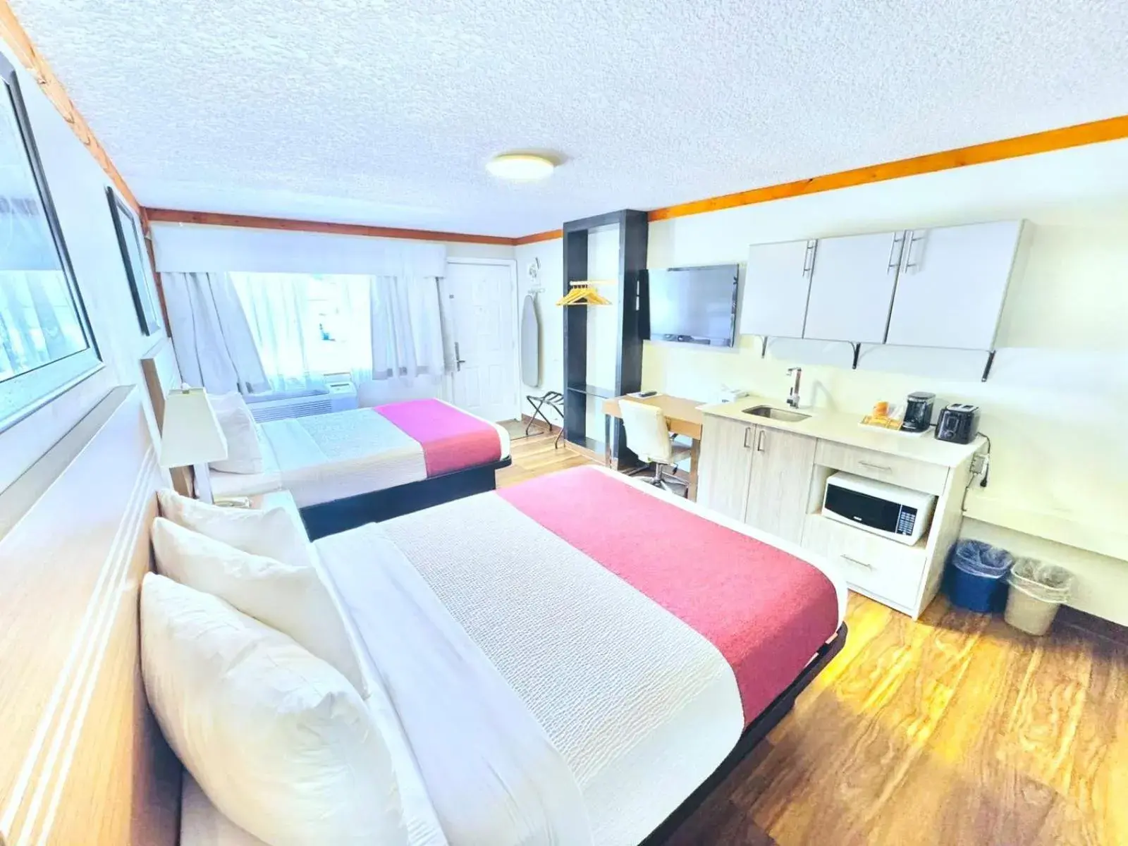 Queen Room with Two Queen Beds and Kitchenette - Pet-Friendly/Non-Smoking in Travelodge by Wyndham Golden Sportsman Lodge Queen Room with Two Queen Beds and Kitchenette - Pet-Friendly/Non-Smoking in Travelodge by Wyndham Golden Sportsman Lodge