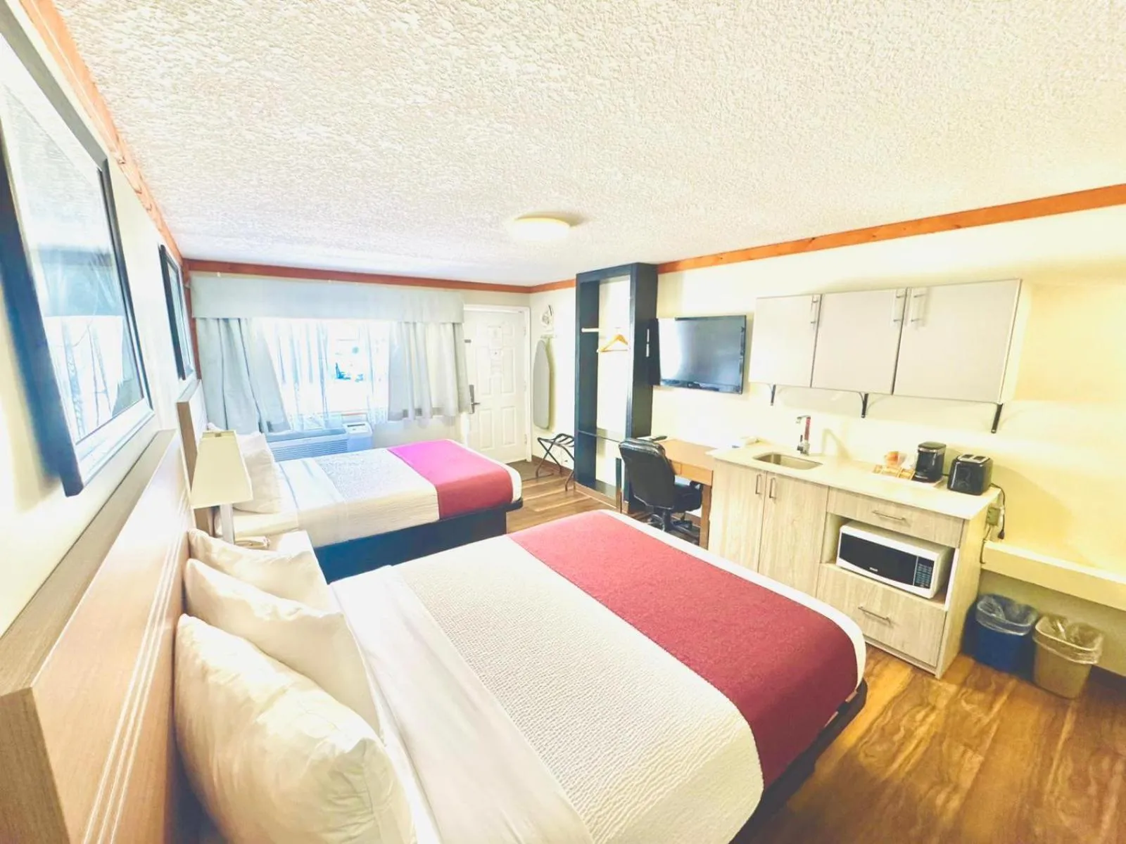 Bed in Travelodge by Wyndham Golden Sportsman Lodge