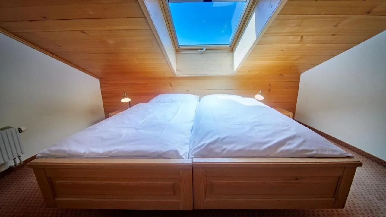 Bed in Hotel Gletscherblick Grindelwald
