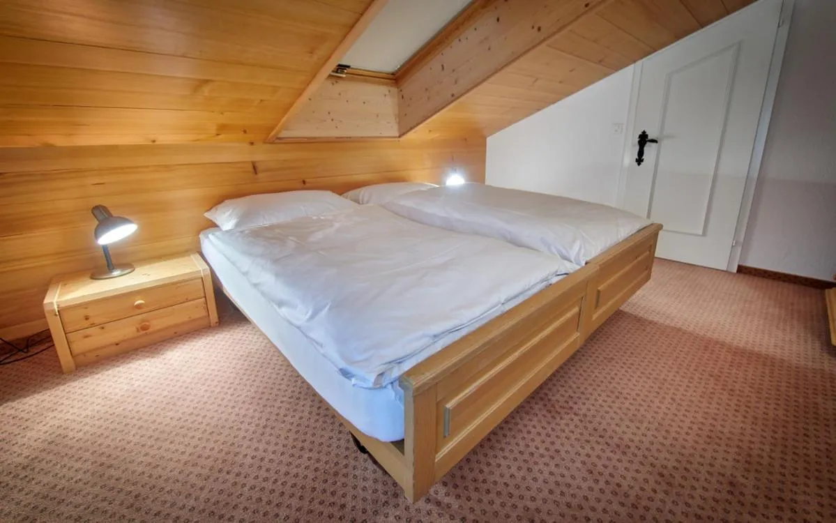 Bed in Hotel Gletscherblick Grindelwald