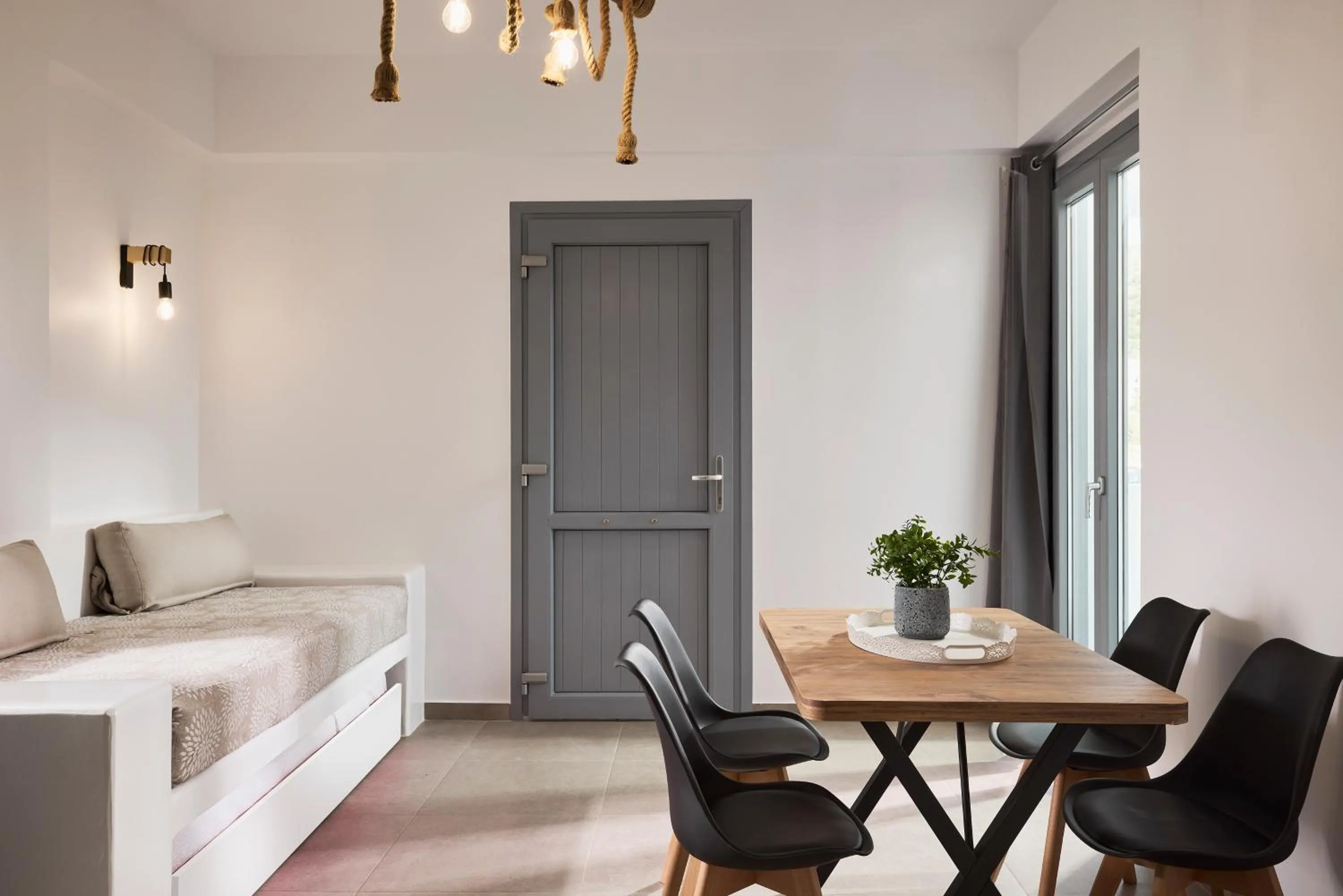 Seating area, Bed in Muses Rooms Milos