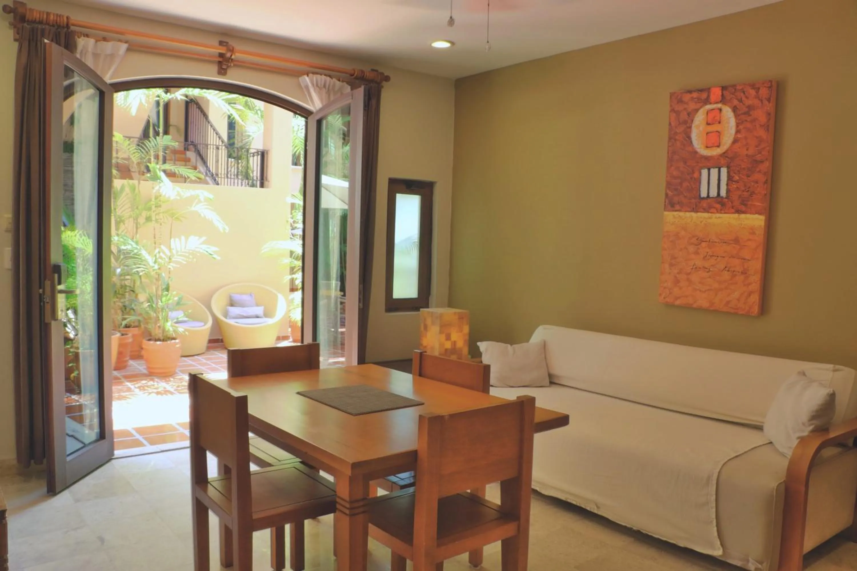 Living room in Acanto Hotel Playa del Carmen, Trademark Collection by Wyndham