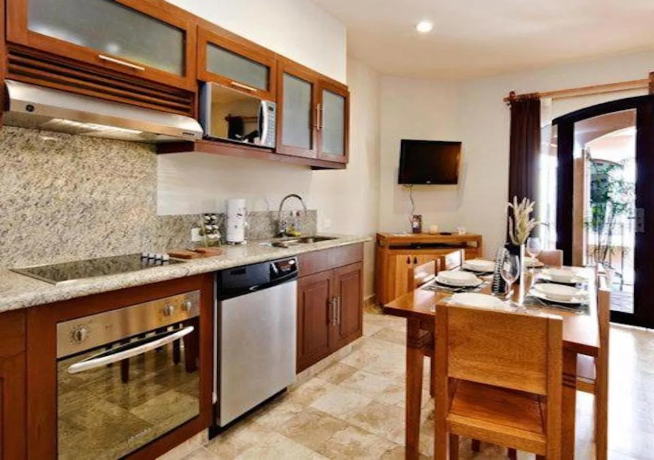Kitchen or kitchenette in Acanto Hotel Playa del Carmen, Trademark Collection by Wyndham