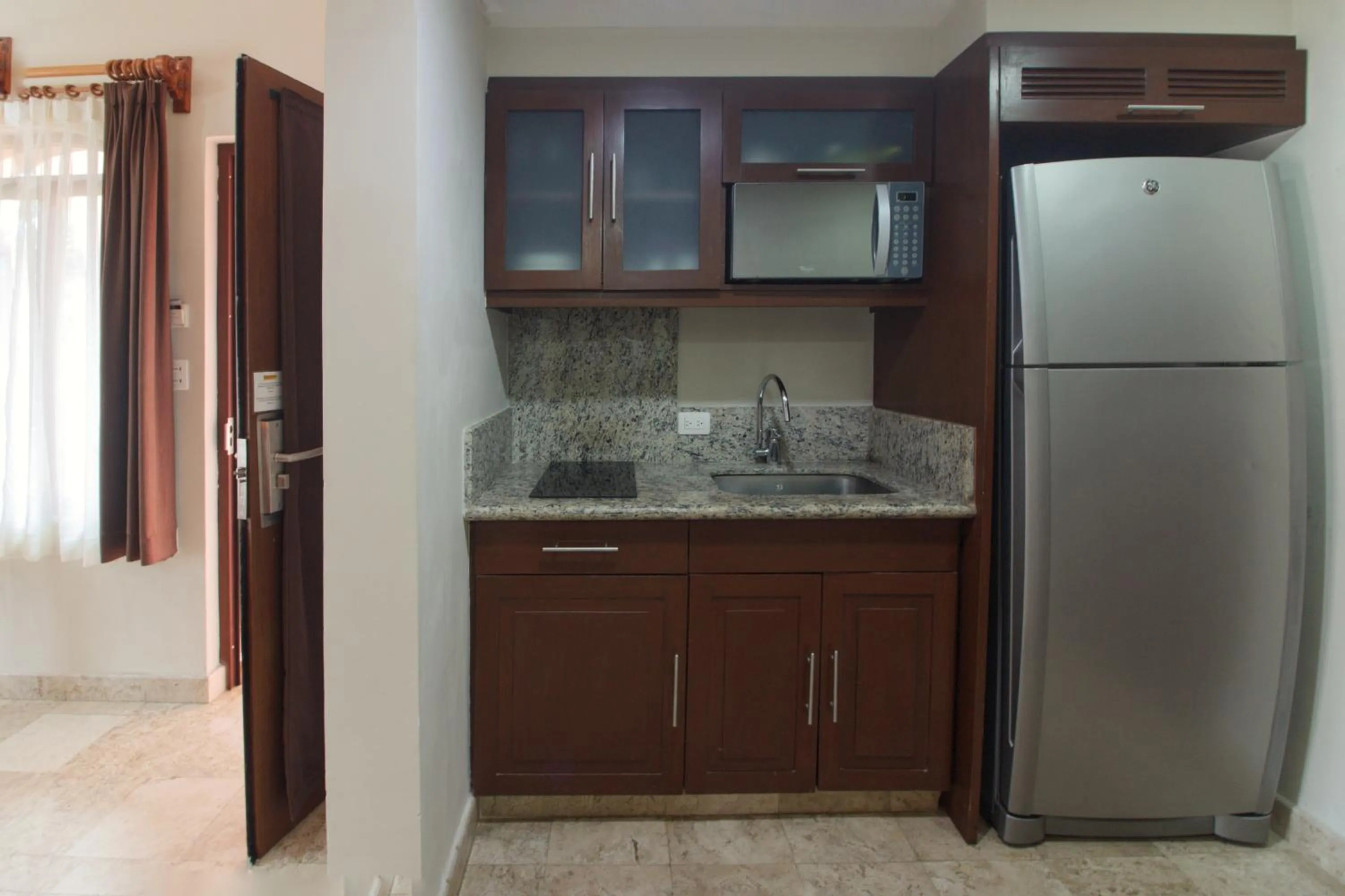 Kitchen or kitchenette in Acanto Hotel Playa del Carmen, Trademark Collection by Wyndham