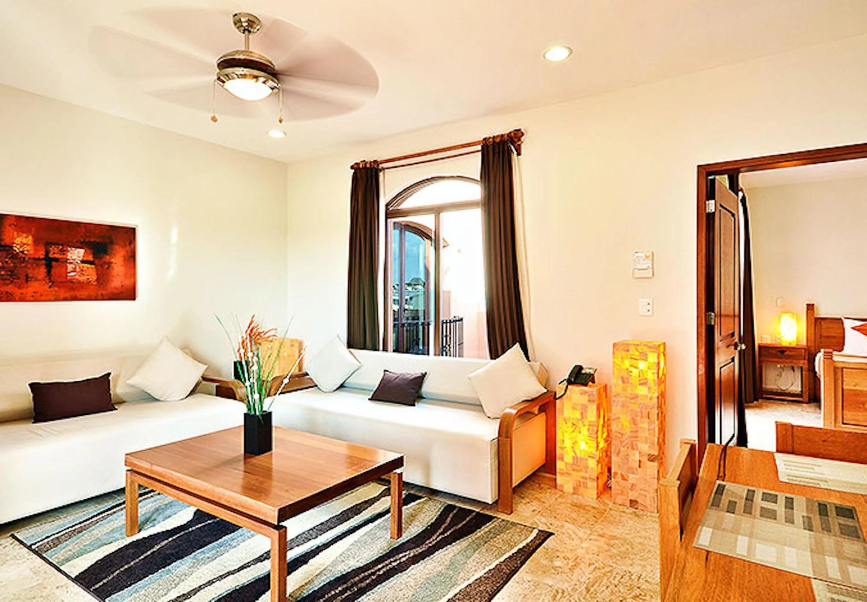 Living room, Bed in Acanto Hotel Playa del Carmen, Trademark Collection by Wyndham