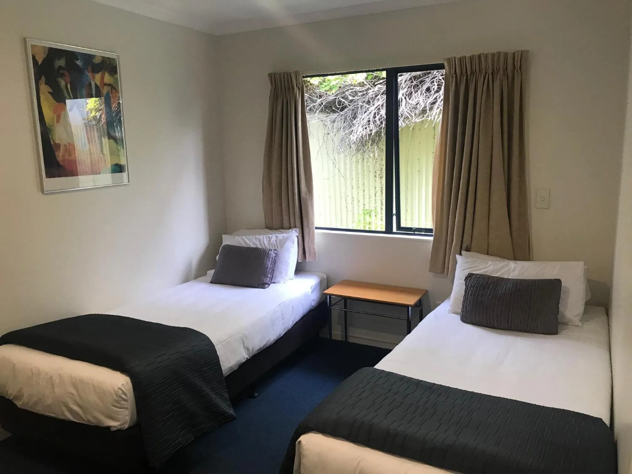 Bed in Claremonte Motor Lodge