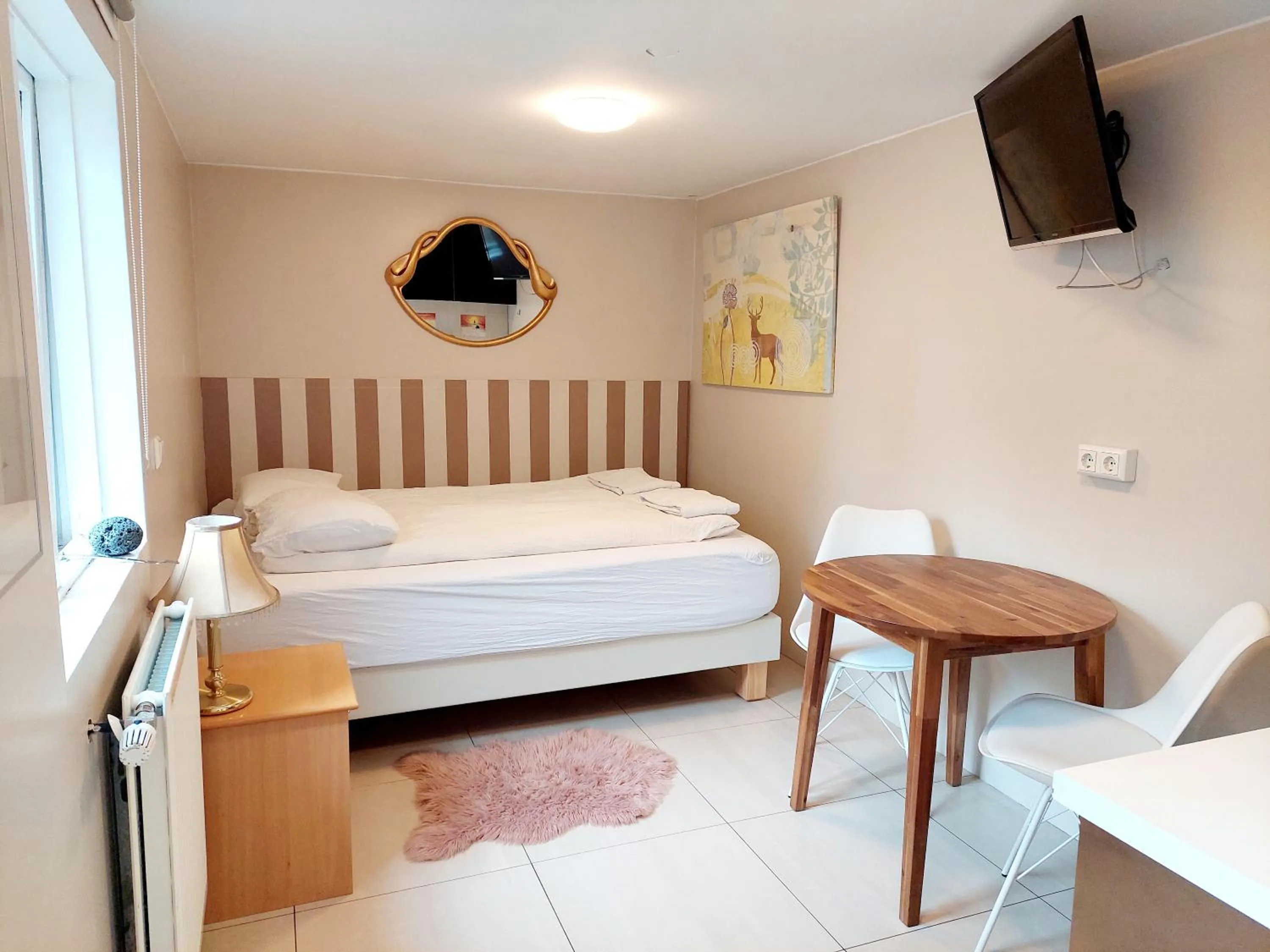 Bed in Igdlo Guesthouse