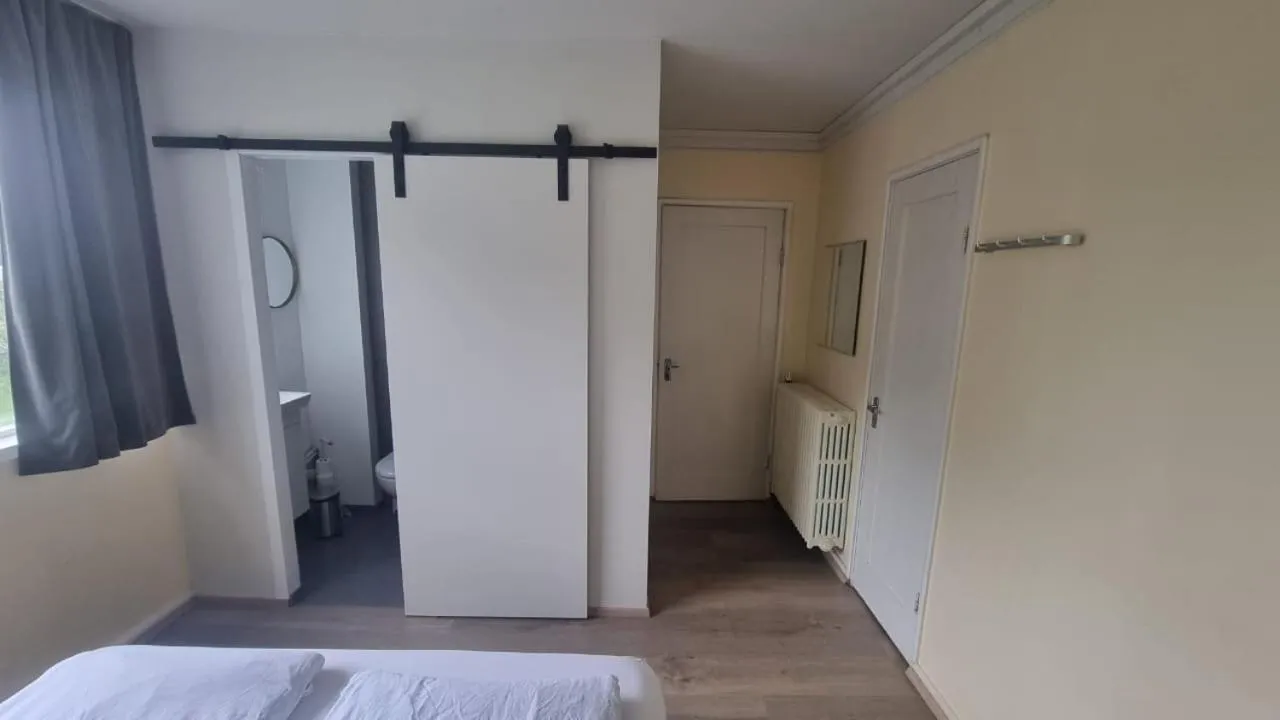 Bed in Igdlo Guesthouse