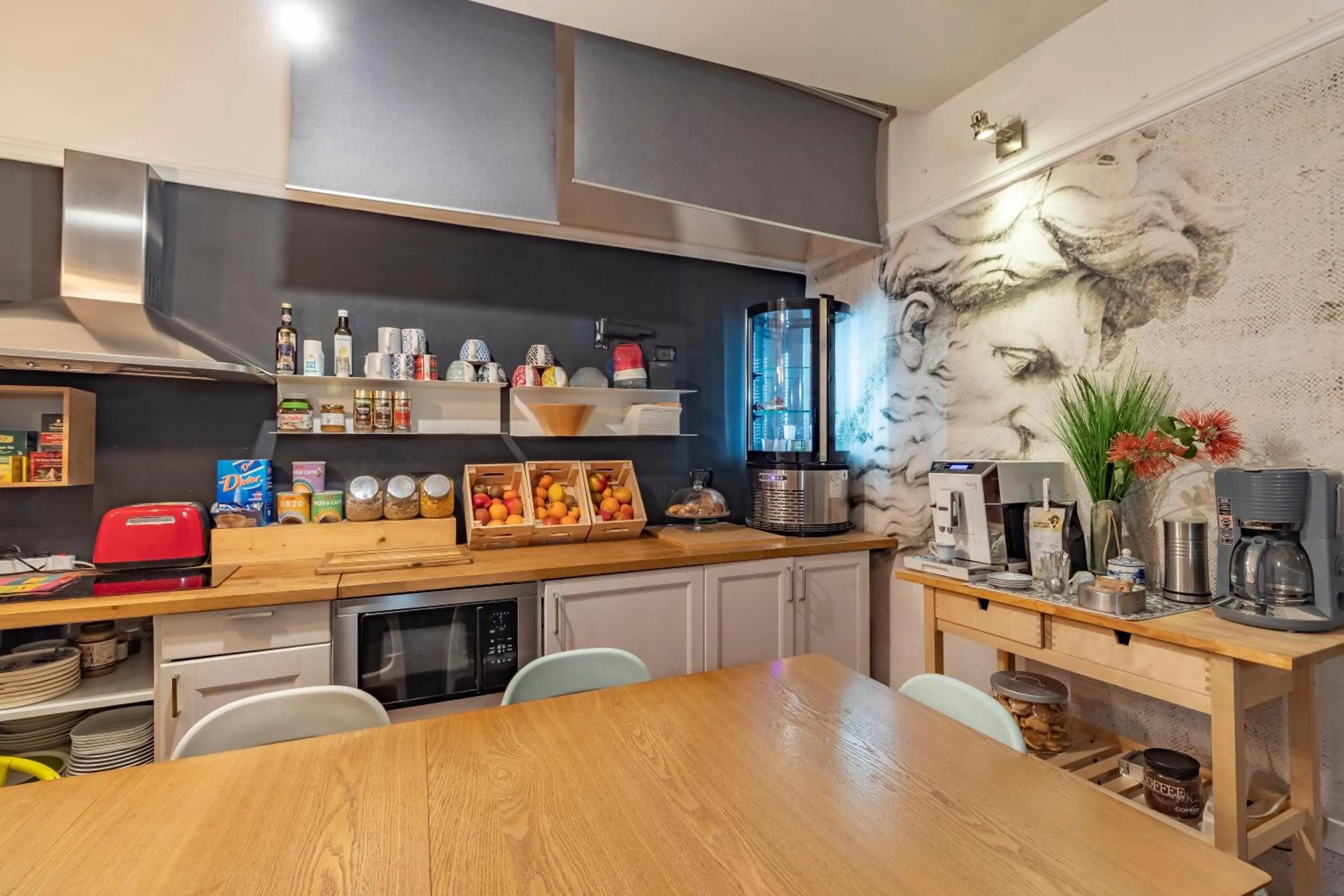 Kitchen or kitchenette in DAB Guest House