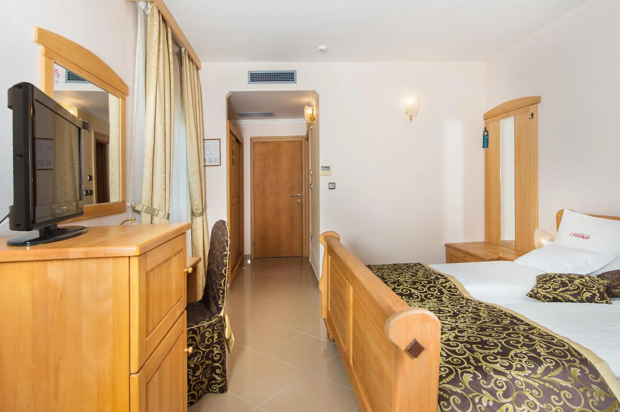 Bed in Hotel Miramare