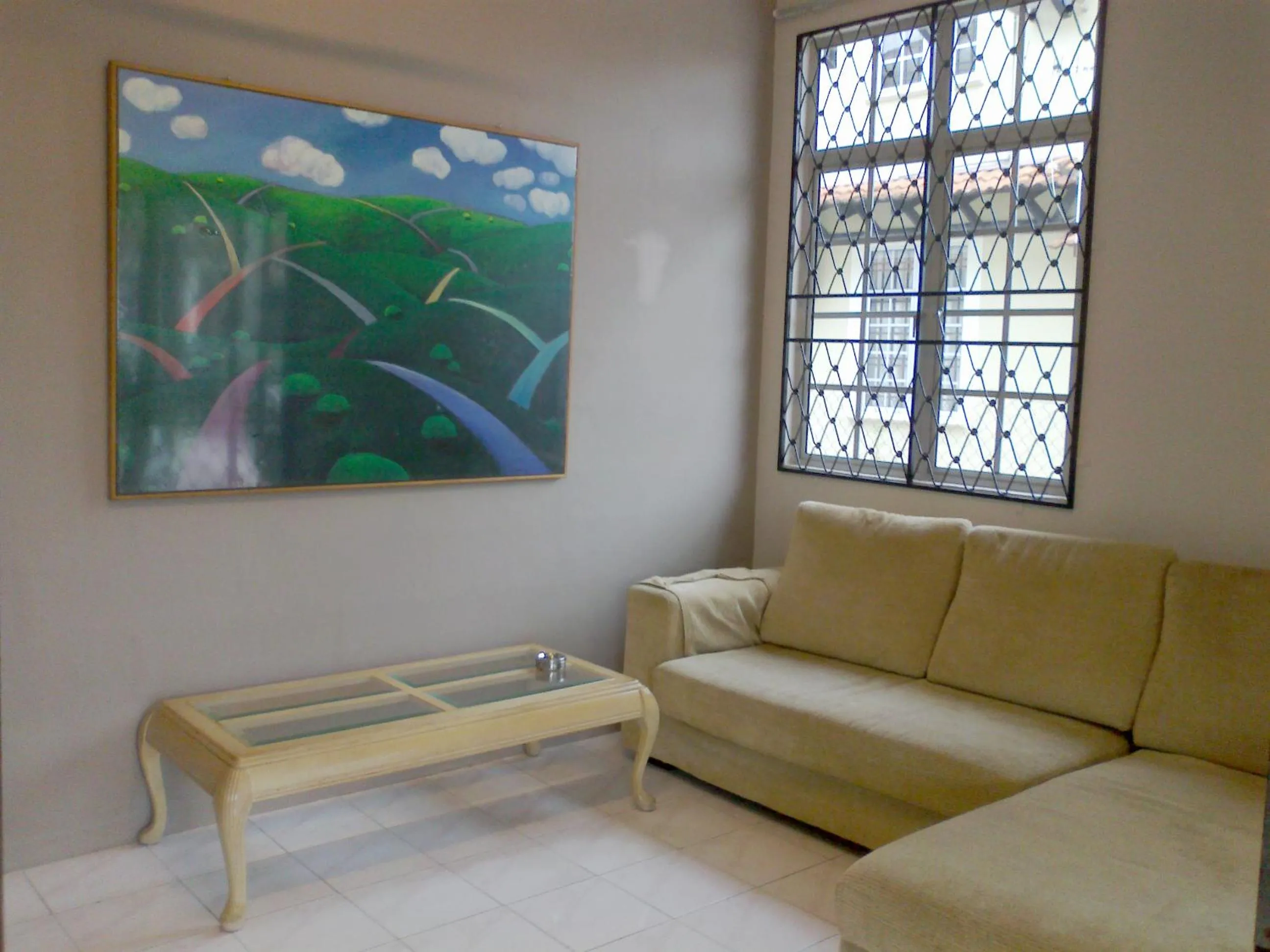 Communal lounge/ TV room in Pan Homestay