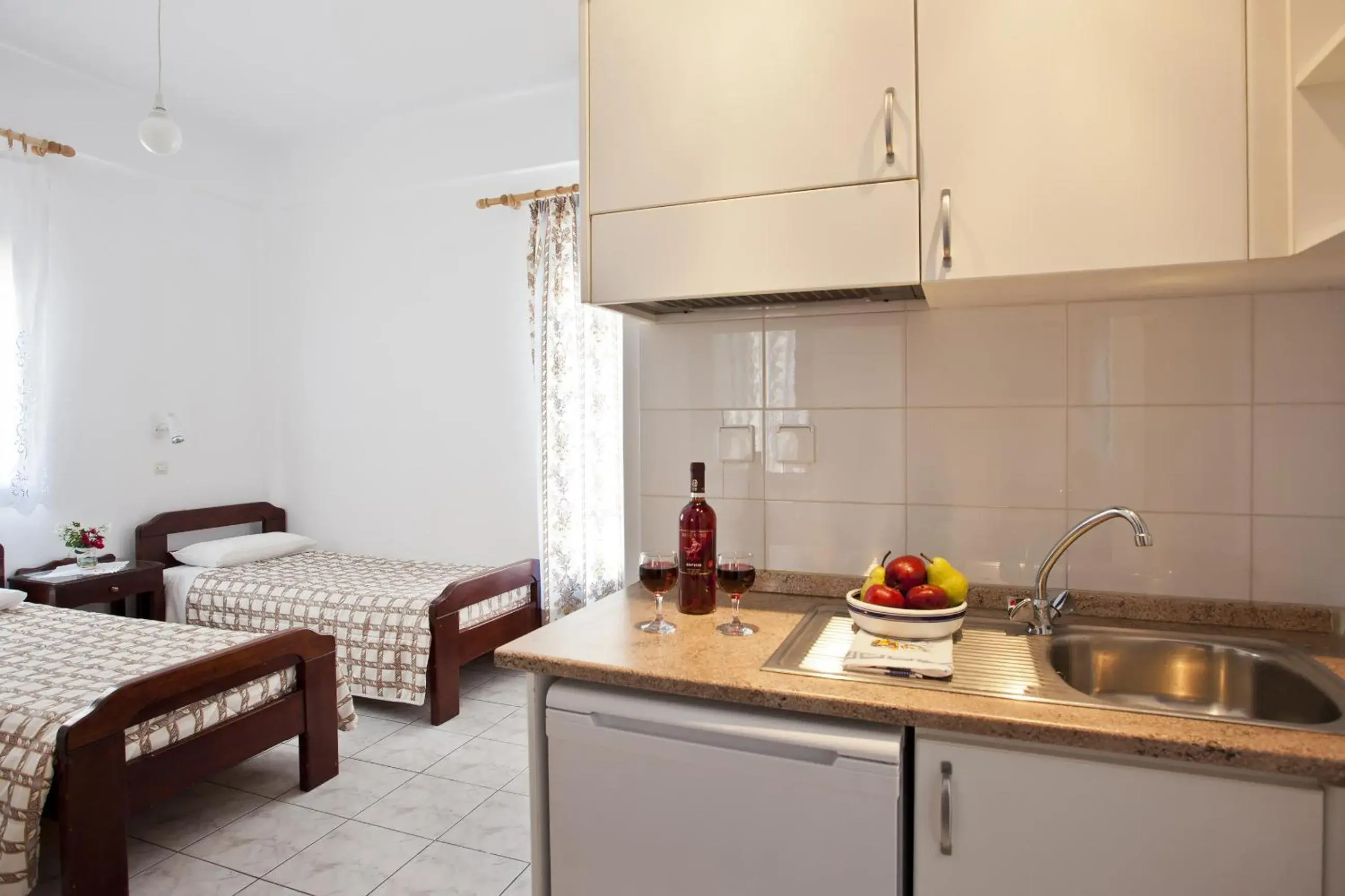 Kitchen or kitchenette, Bed in Ancient Thera Studios Kitchen or kitchenette, Bed in Ancient Thera Studios
