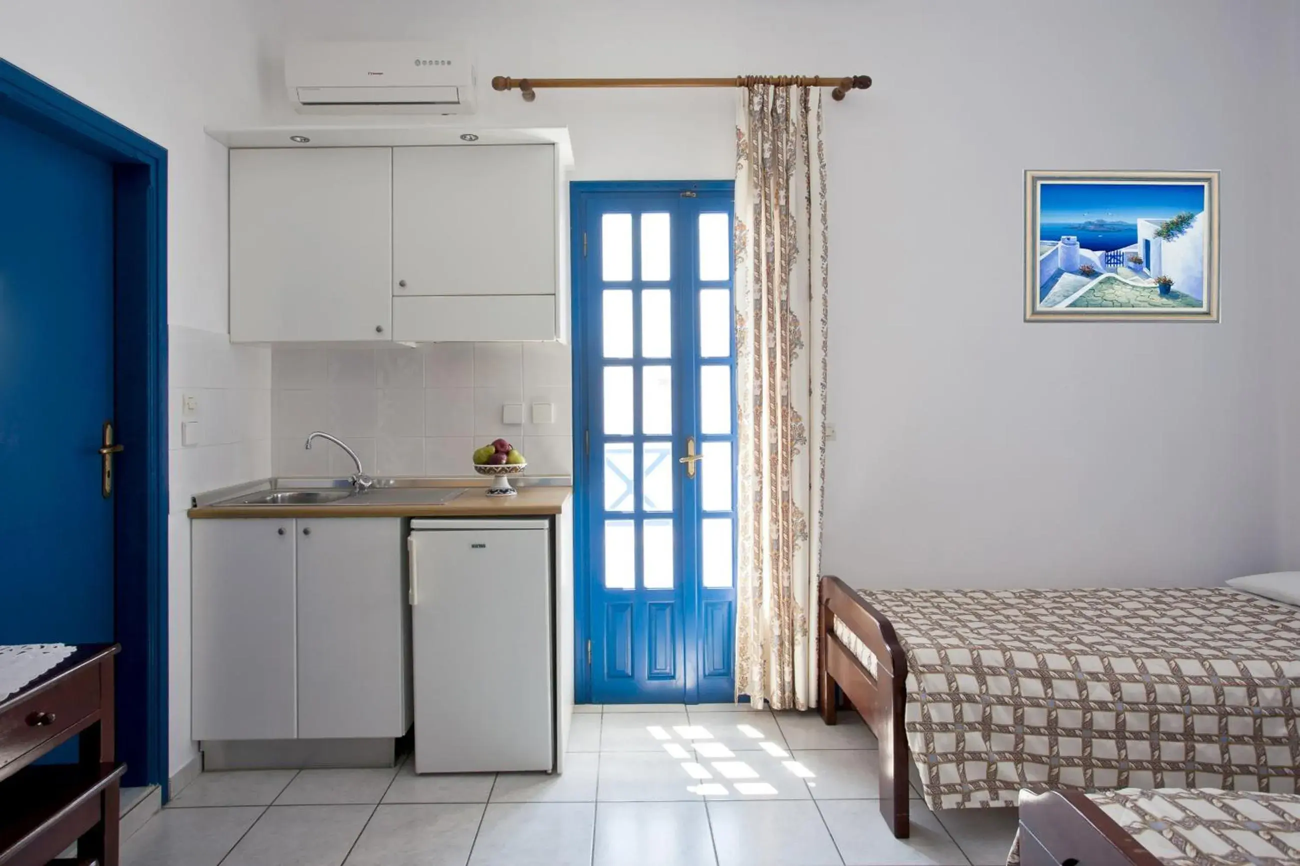 Bedroom, Bed in Ancient Thera Studios Bedroom, Bed in Ancient Thera Studios