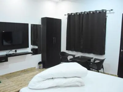 Bed in Hotel Rajshree