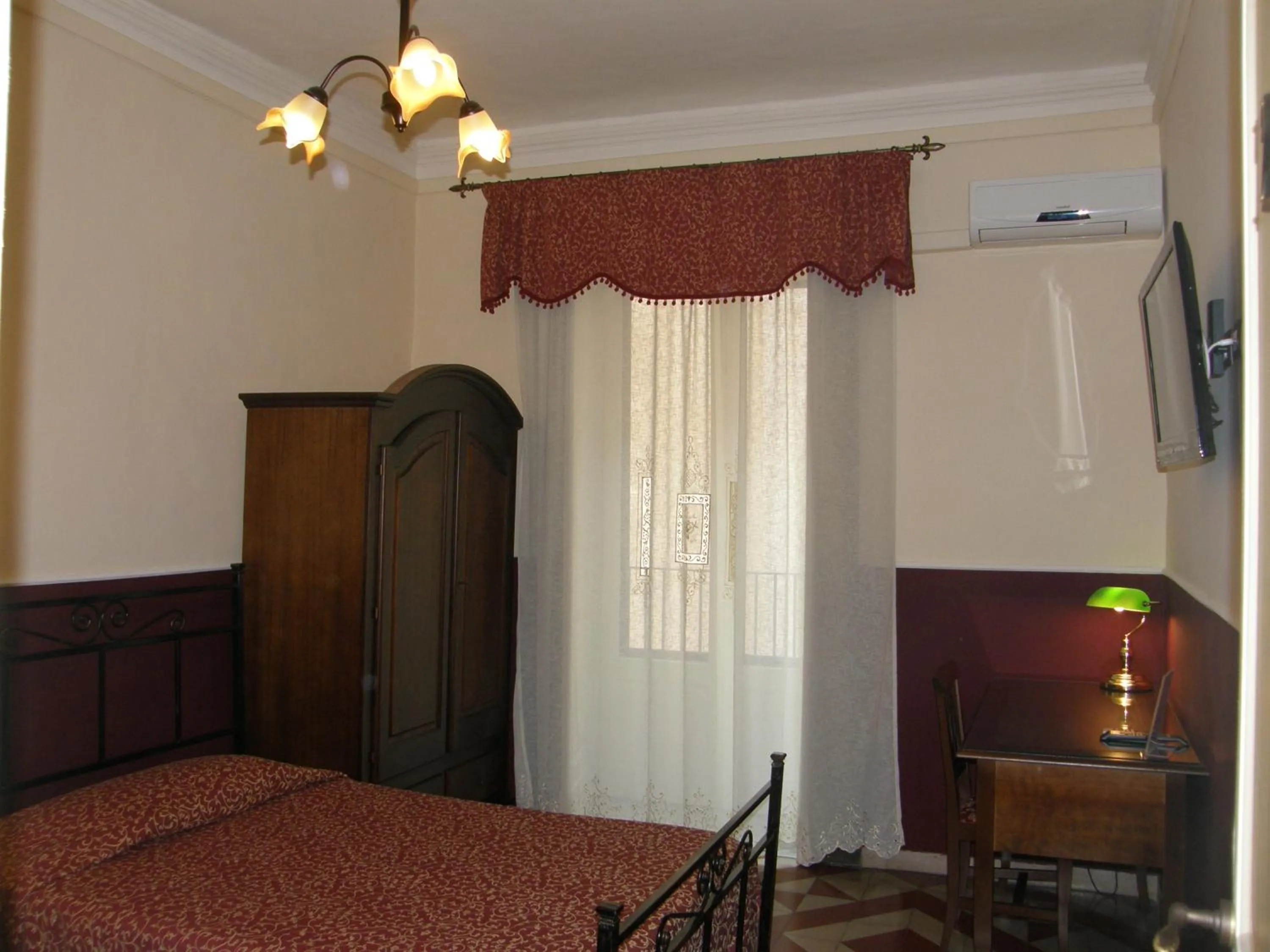 Photo of the whole room, Bed in Il Gattopardo House